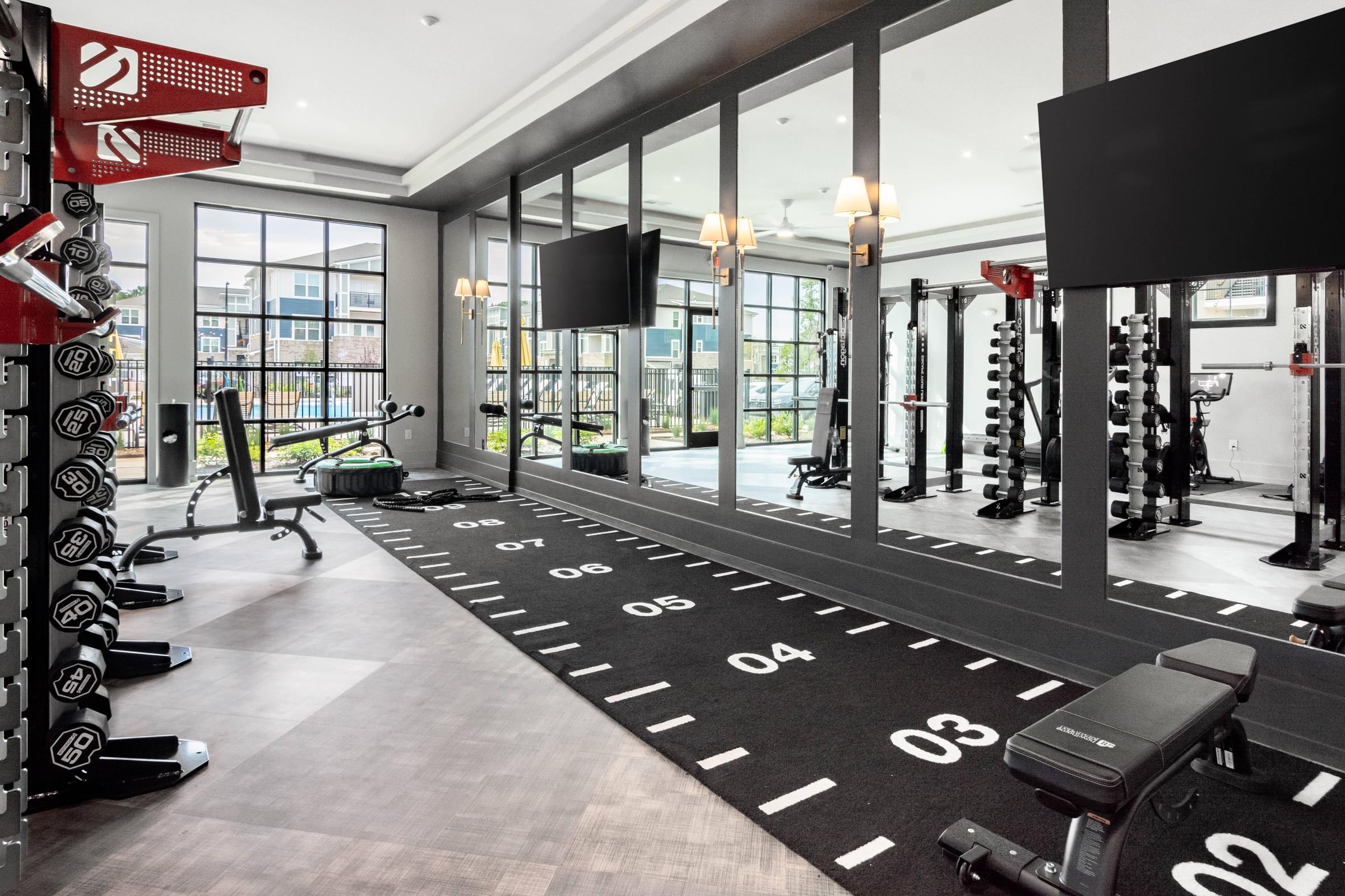 Spacious Fitness Center Equipped with Bikes, and Free Weights
