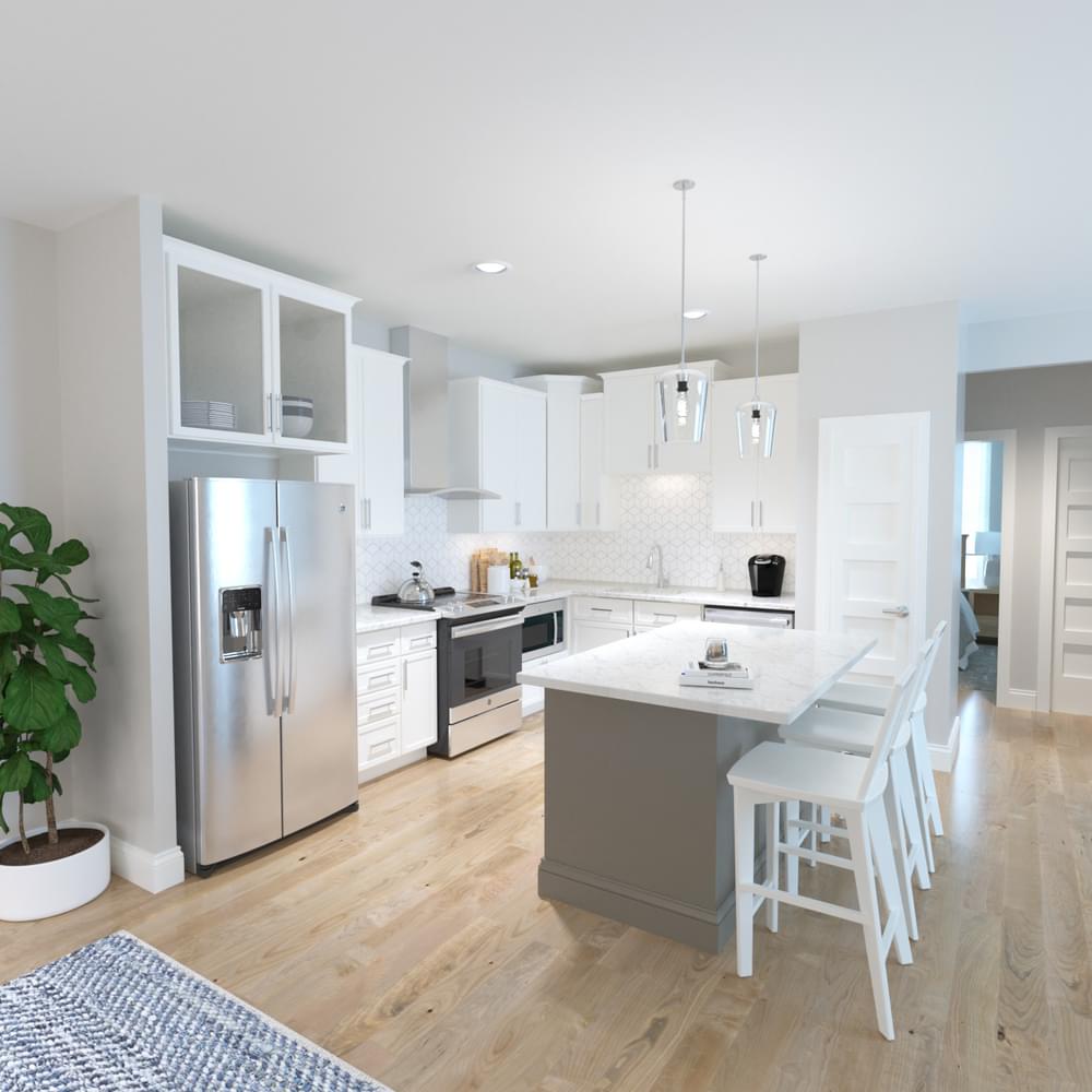 a white and gray kitchen with stainless steel appliances and a large island
