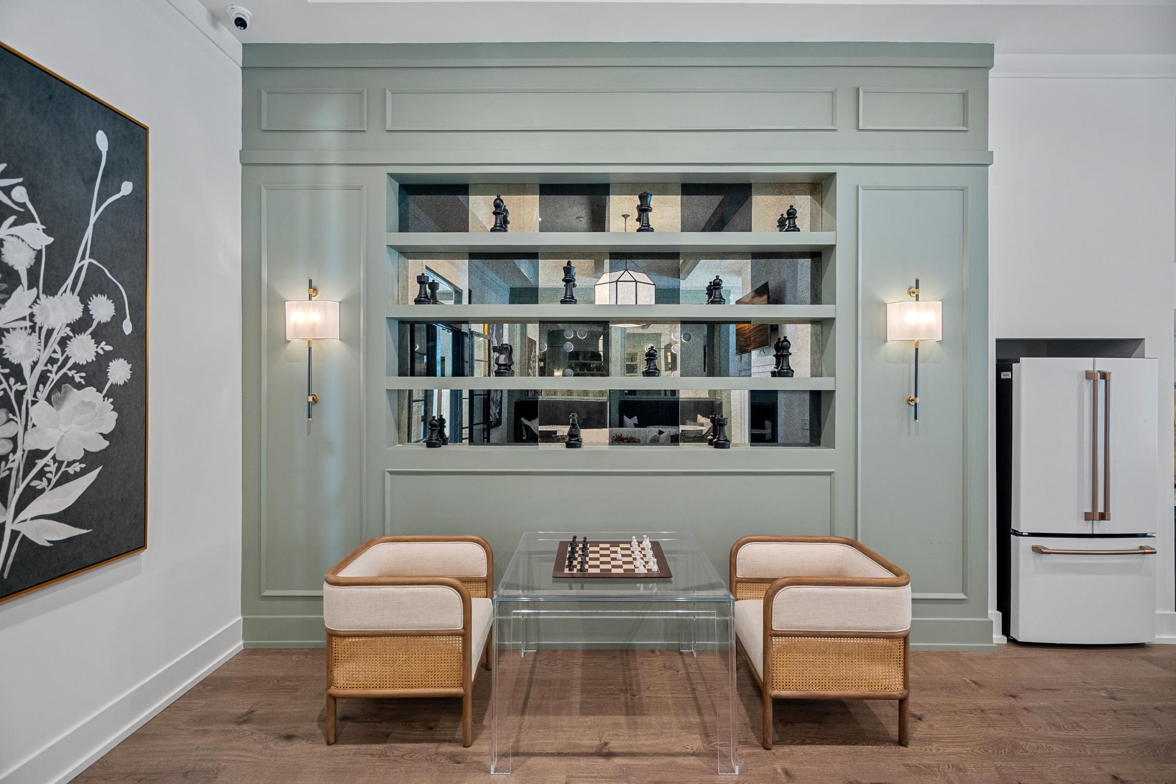 Seating area with two benches a table and chess to play.