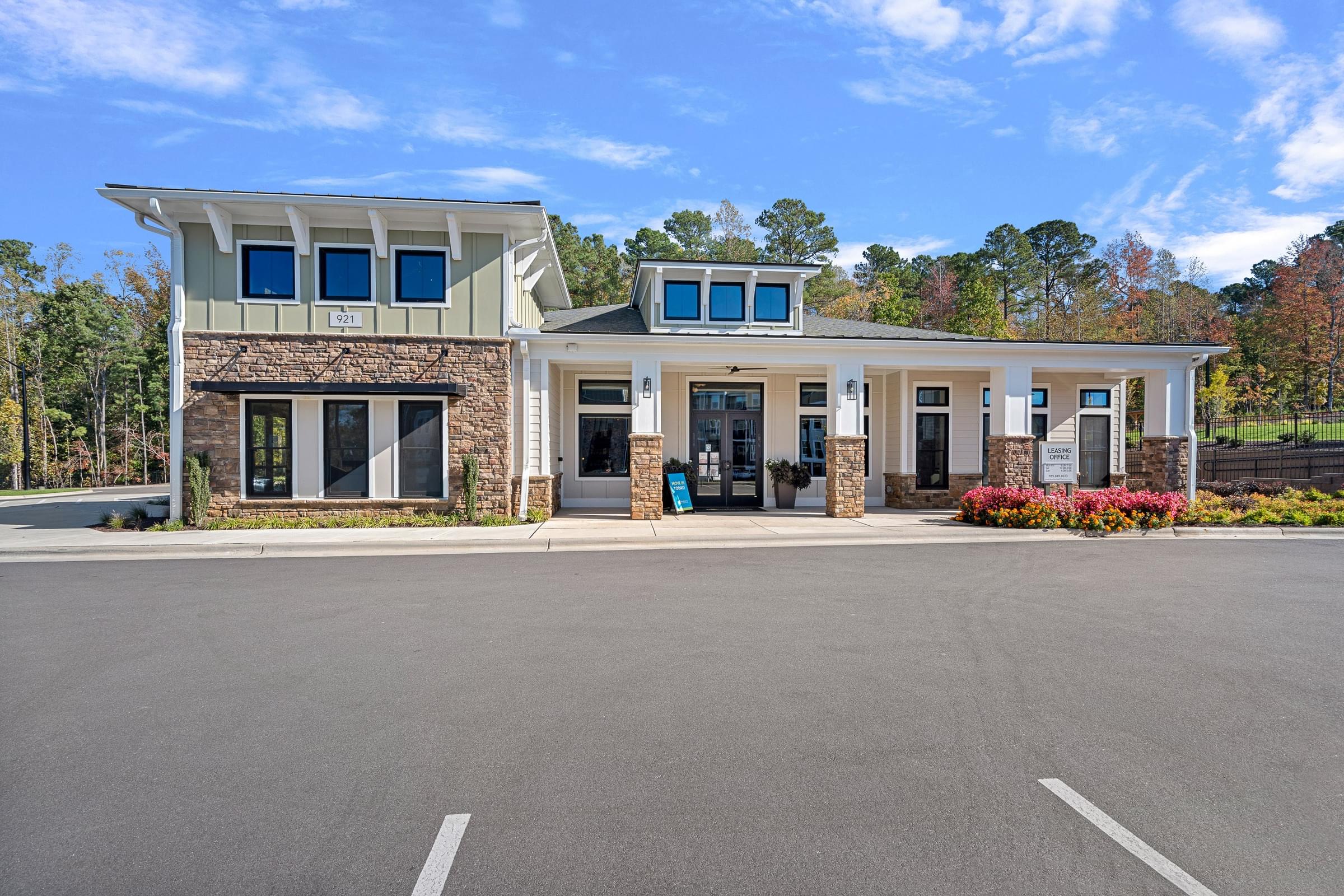 Front Exterior View of Complex with a Parking Lot.