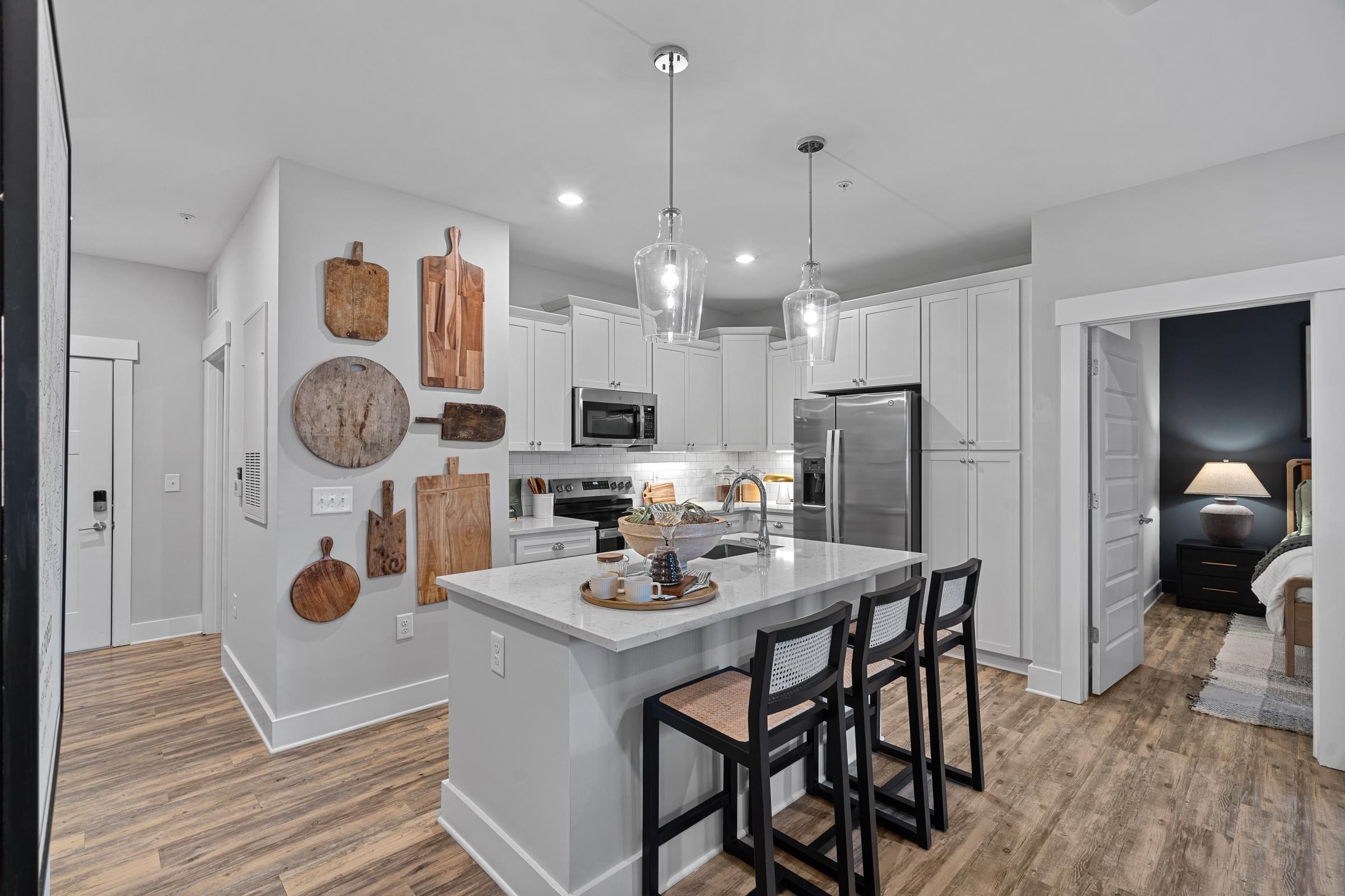 Modern Kitchens with Stand-Alone Islands, Designer Tile Backsplash and Granite Countertops