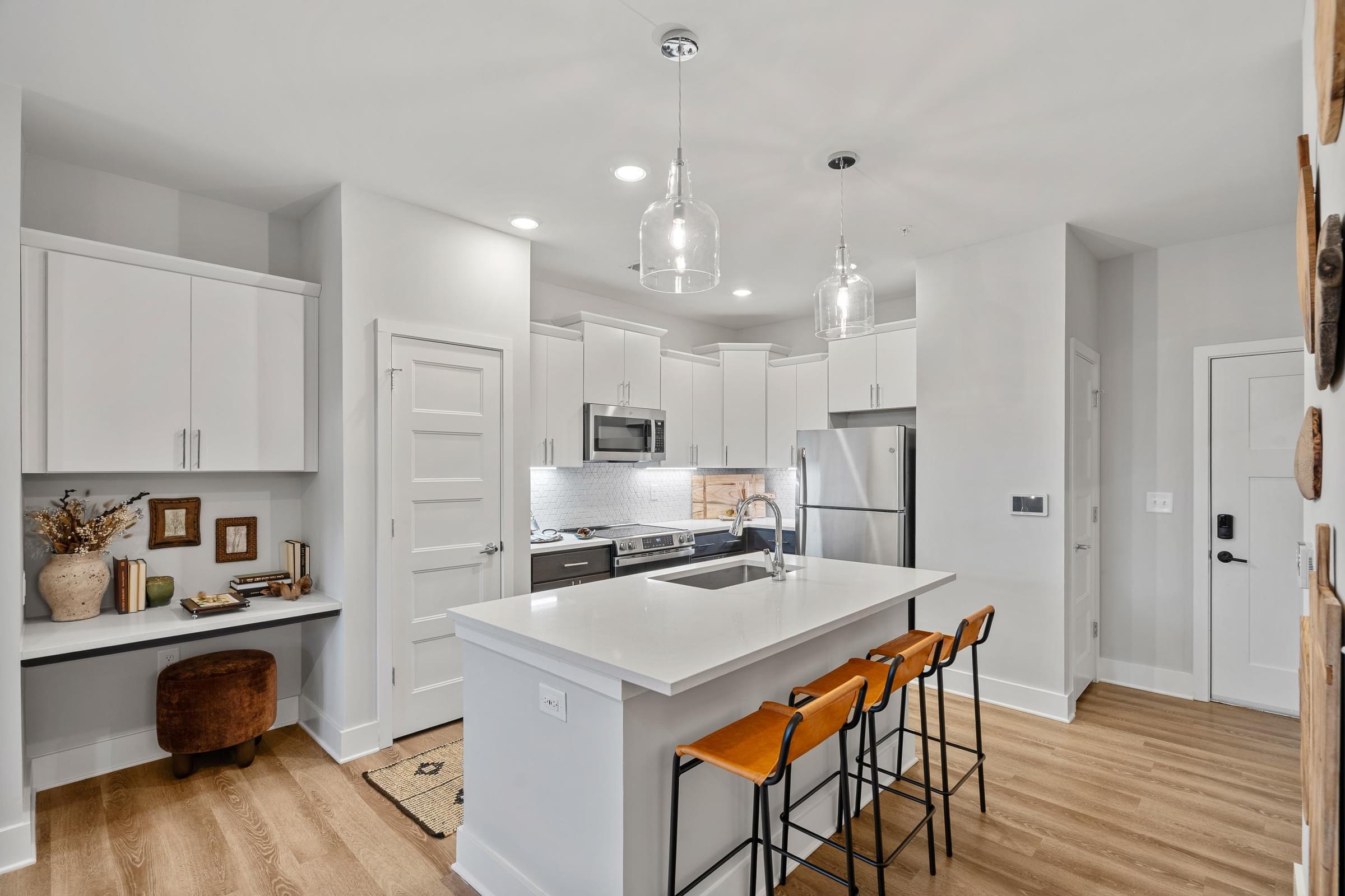 Modern Kitchens with Smooth Ceramic Cooktops, Designer Tile Backsplash, and Quartz Countertops