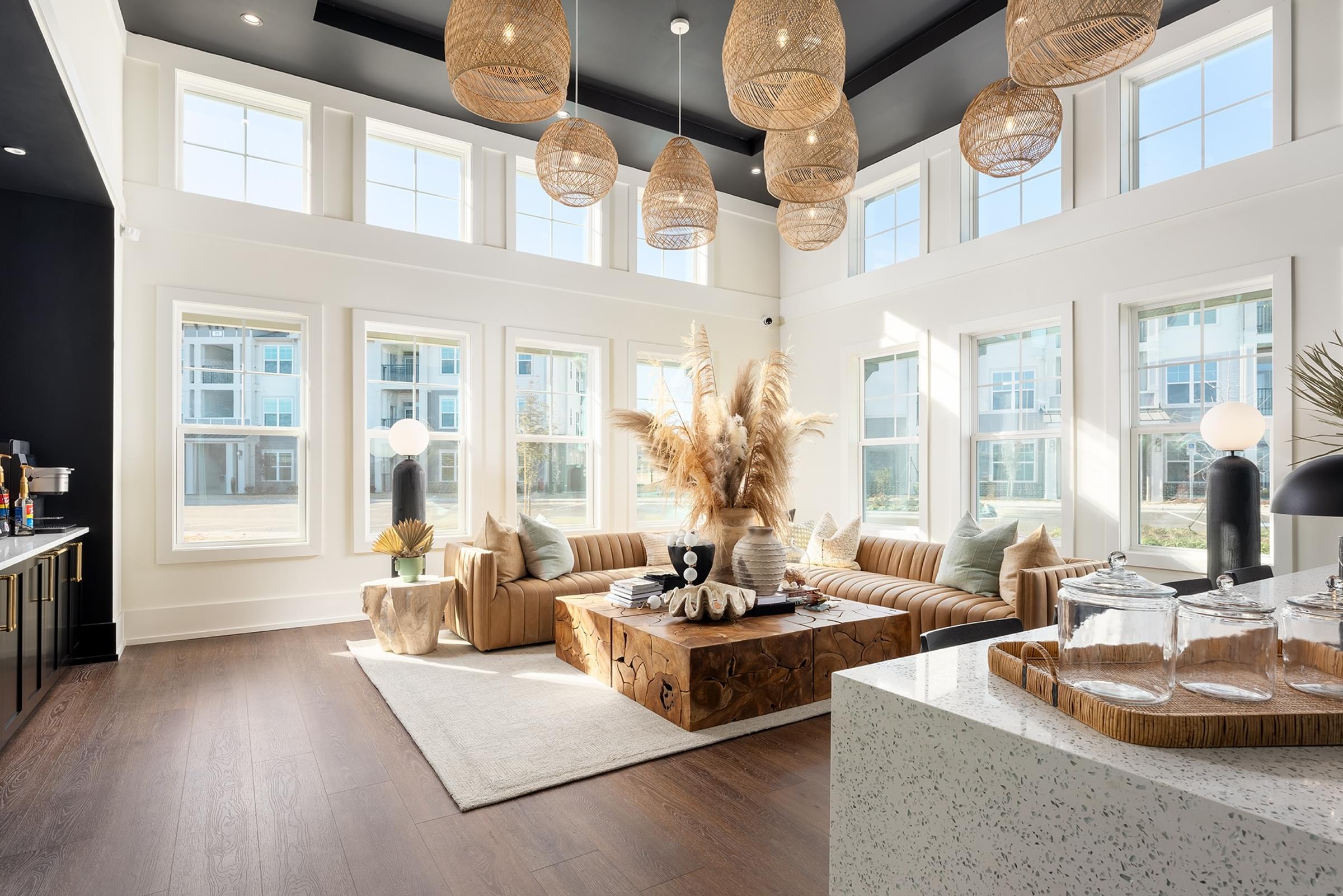 Spacious Lounge Area with a Coffee Machine and Lounge-Style Seating