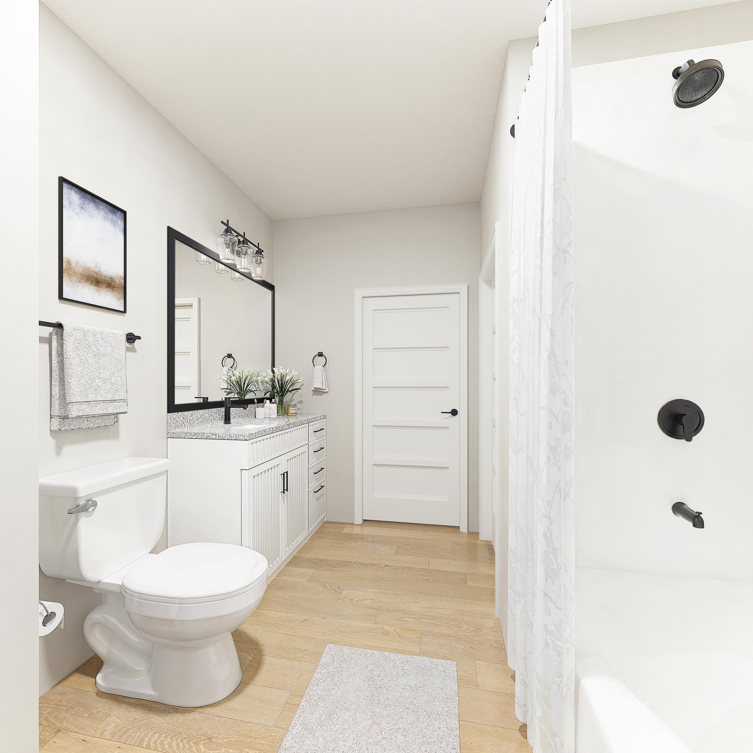 A white bathroom with a toilet, sink, and mirror.