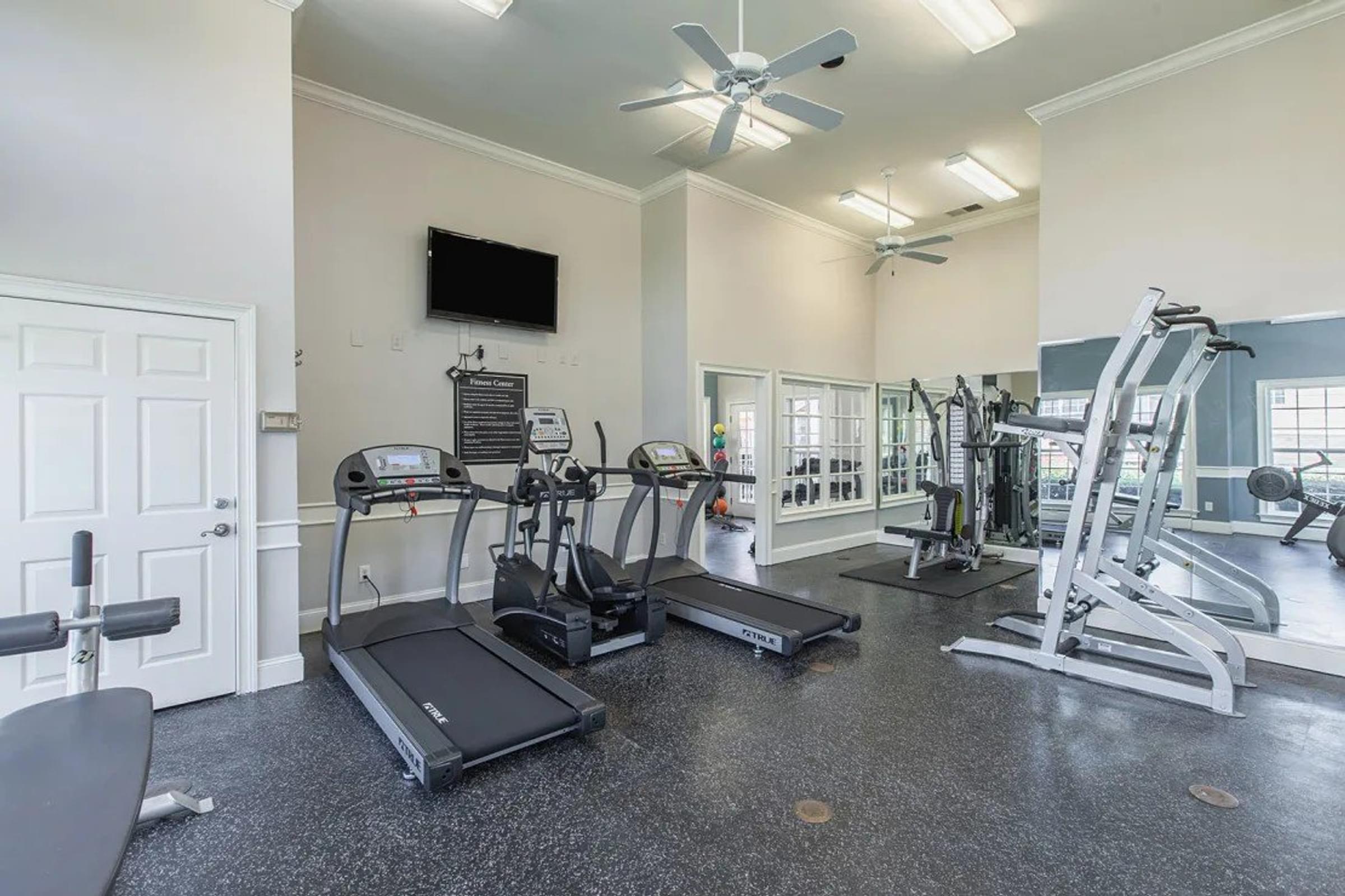 A Spacious Gym with a Variety of Exercise Equipment for Residents Use.