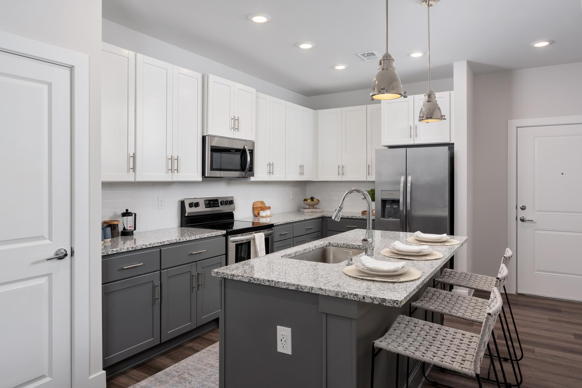 Modern Kitchens with Stand-Alone Islands, Granite Countertops, and Stainless Steel Appliances