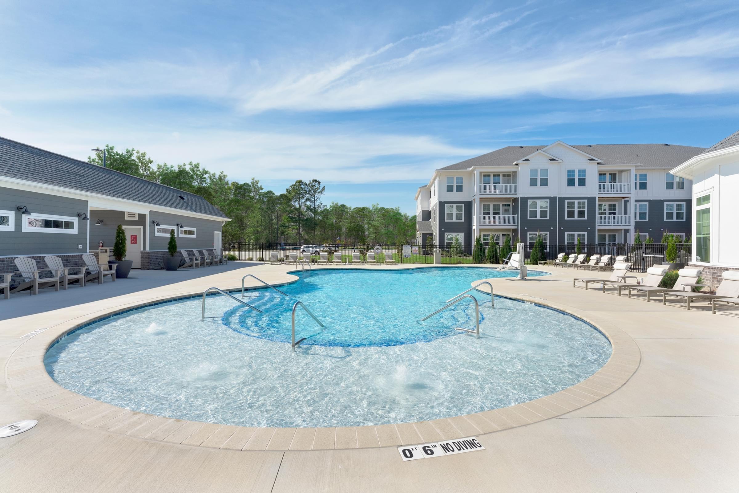 A large outdoor swimming pool with the number 06 on the ground.