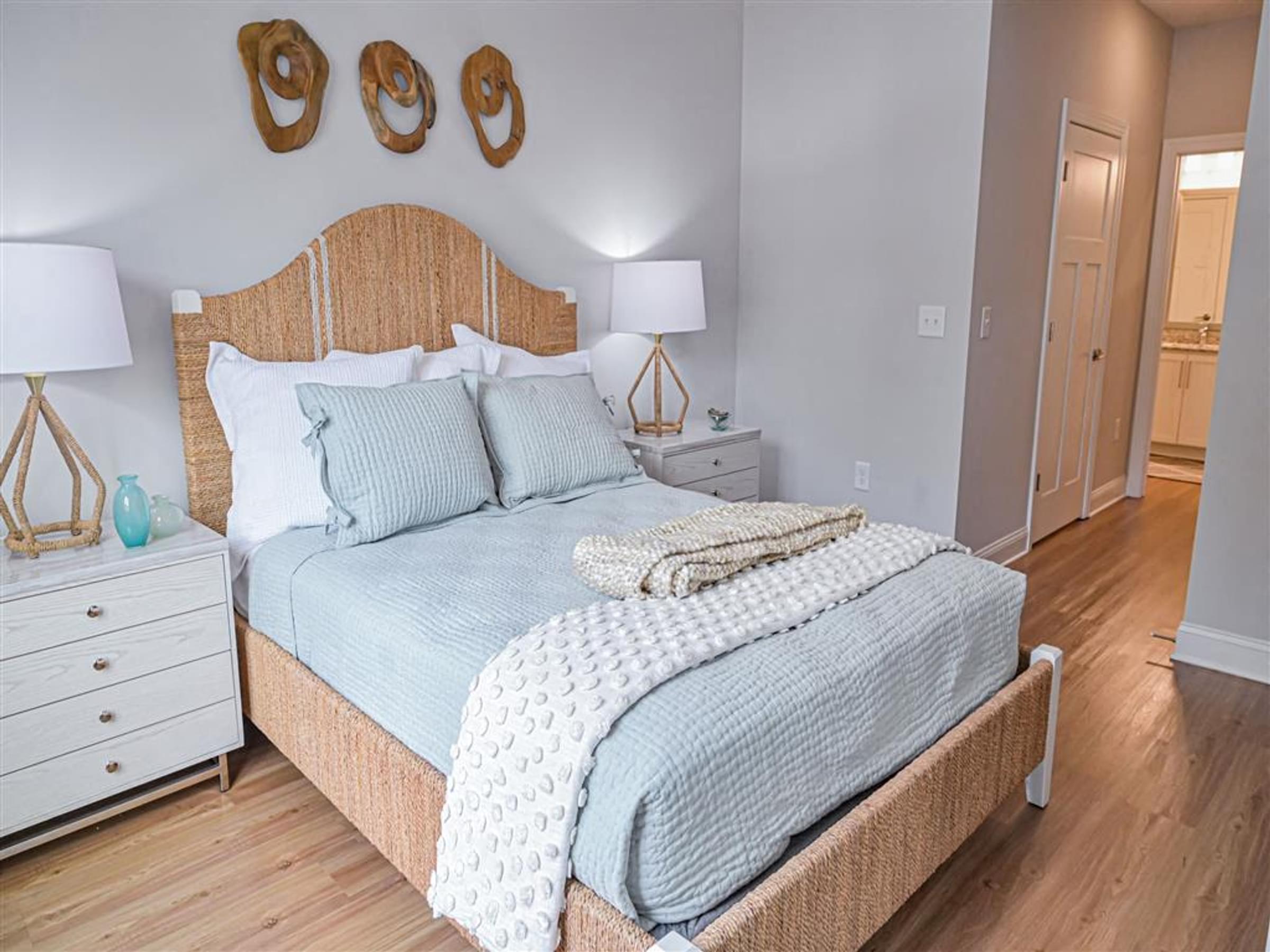 a bedroom with a bed and a closet