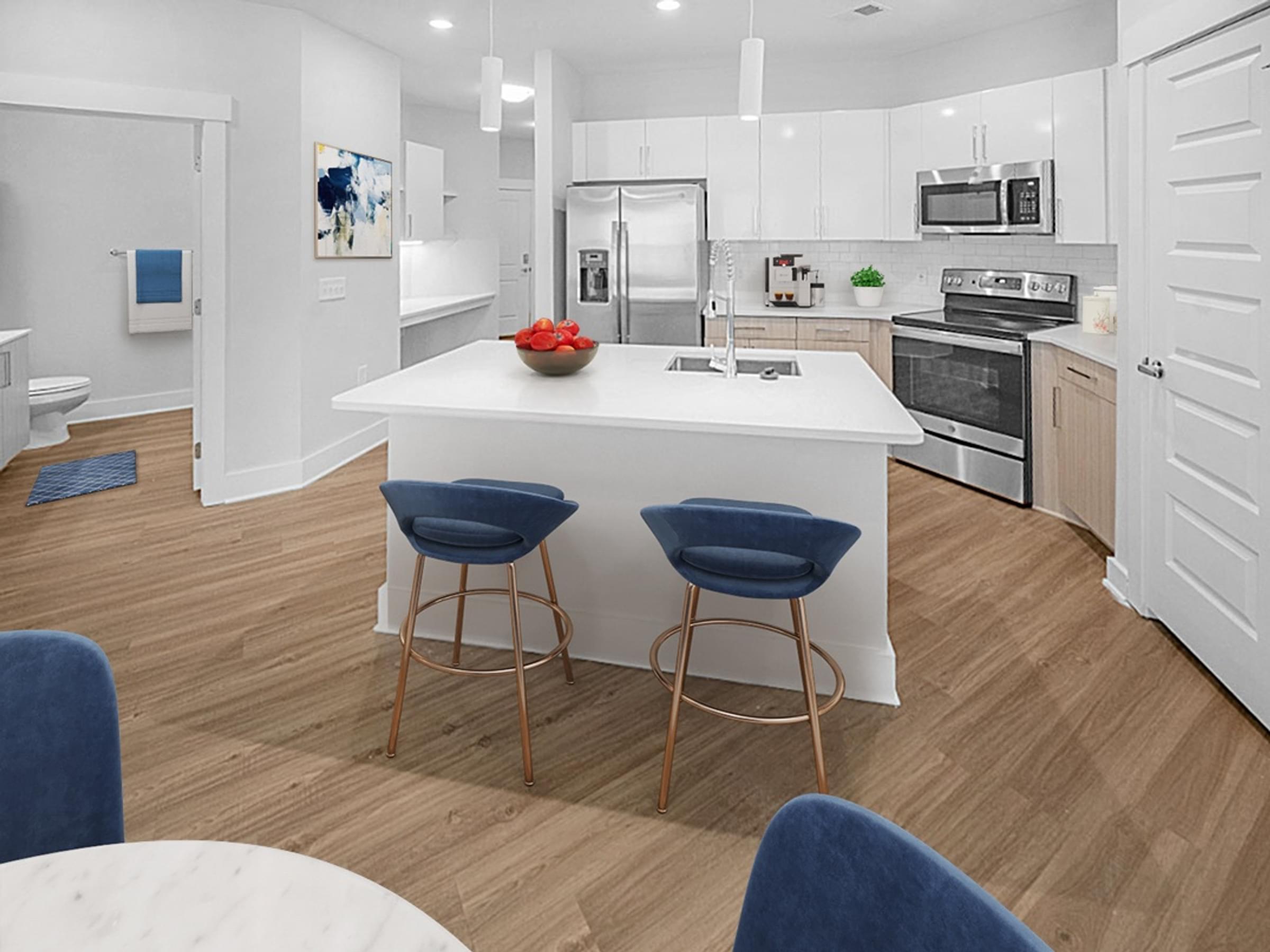 modern upgraded kitchen with granite countertops and stainless steel appliances
