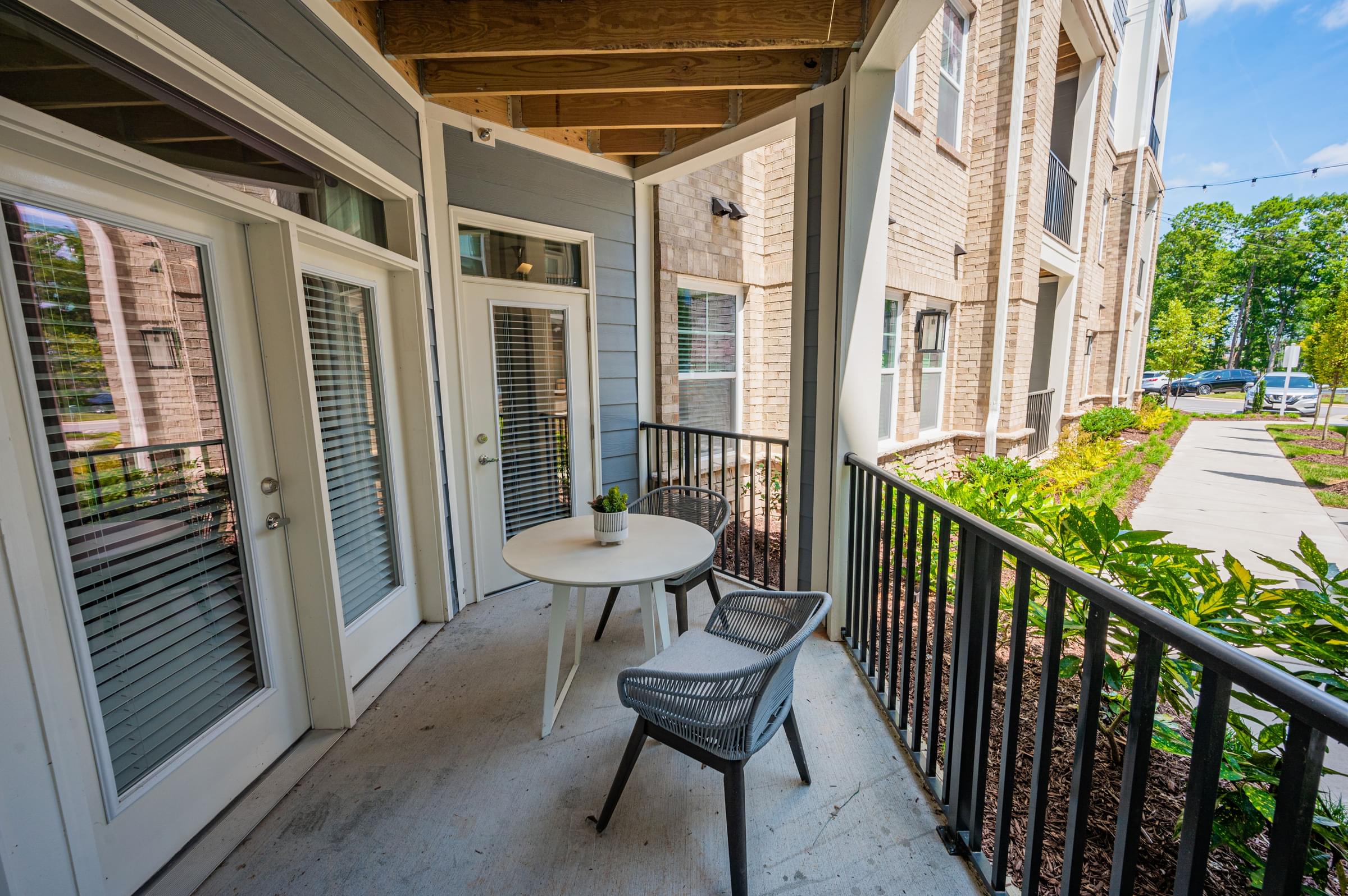 Spacious Private Balcony Overlooking Beautifully Landscaped Courtyard