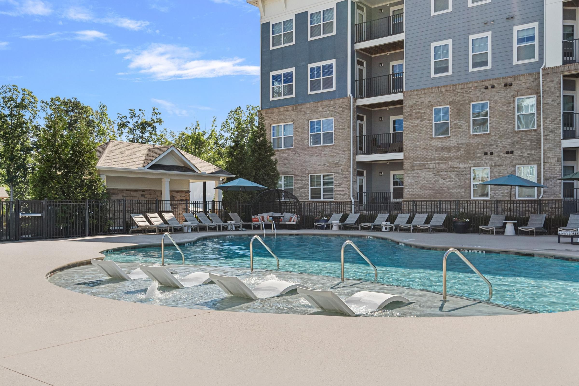 Custom Saltwater Swimming Pool with Sun Shelf and Poolside Cabana