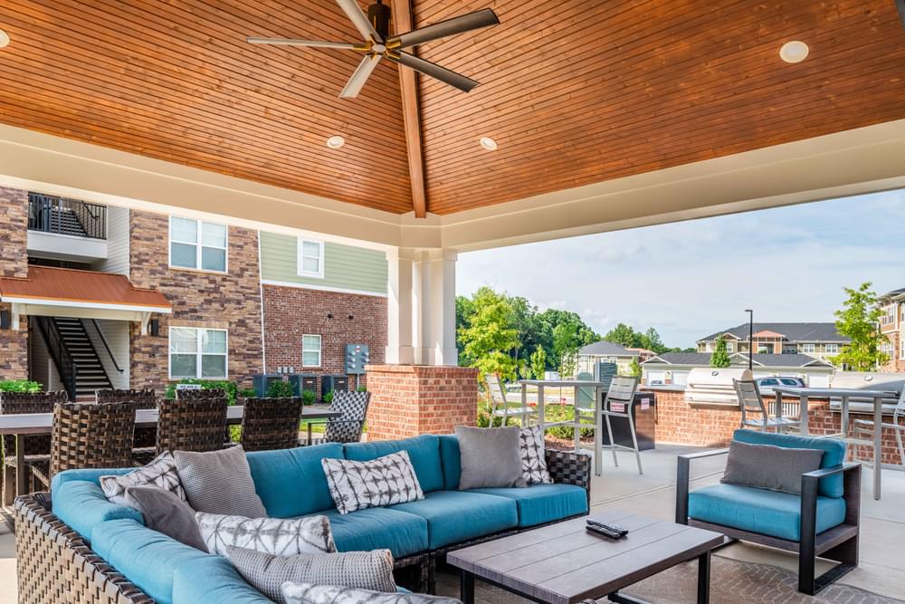 the preserve at ballantyne commons covered patio with couches and chairs