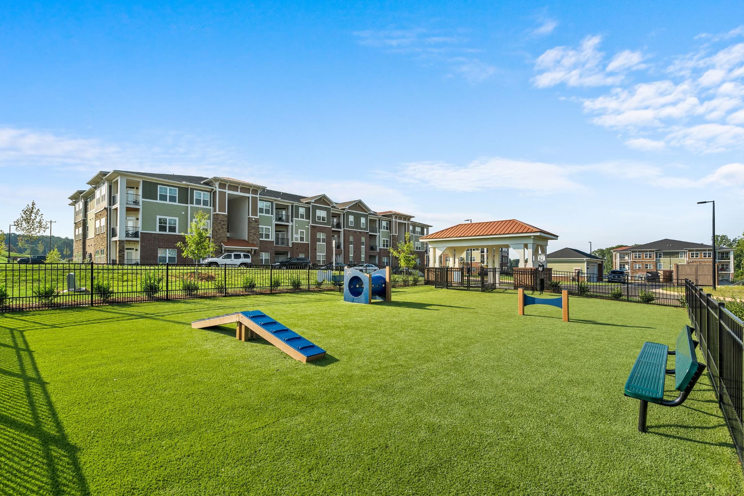 Amenities Highlight luxurious pool with small fountains, lounge seating, and cabanas