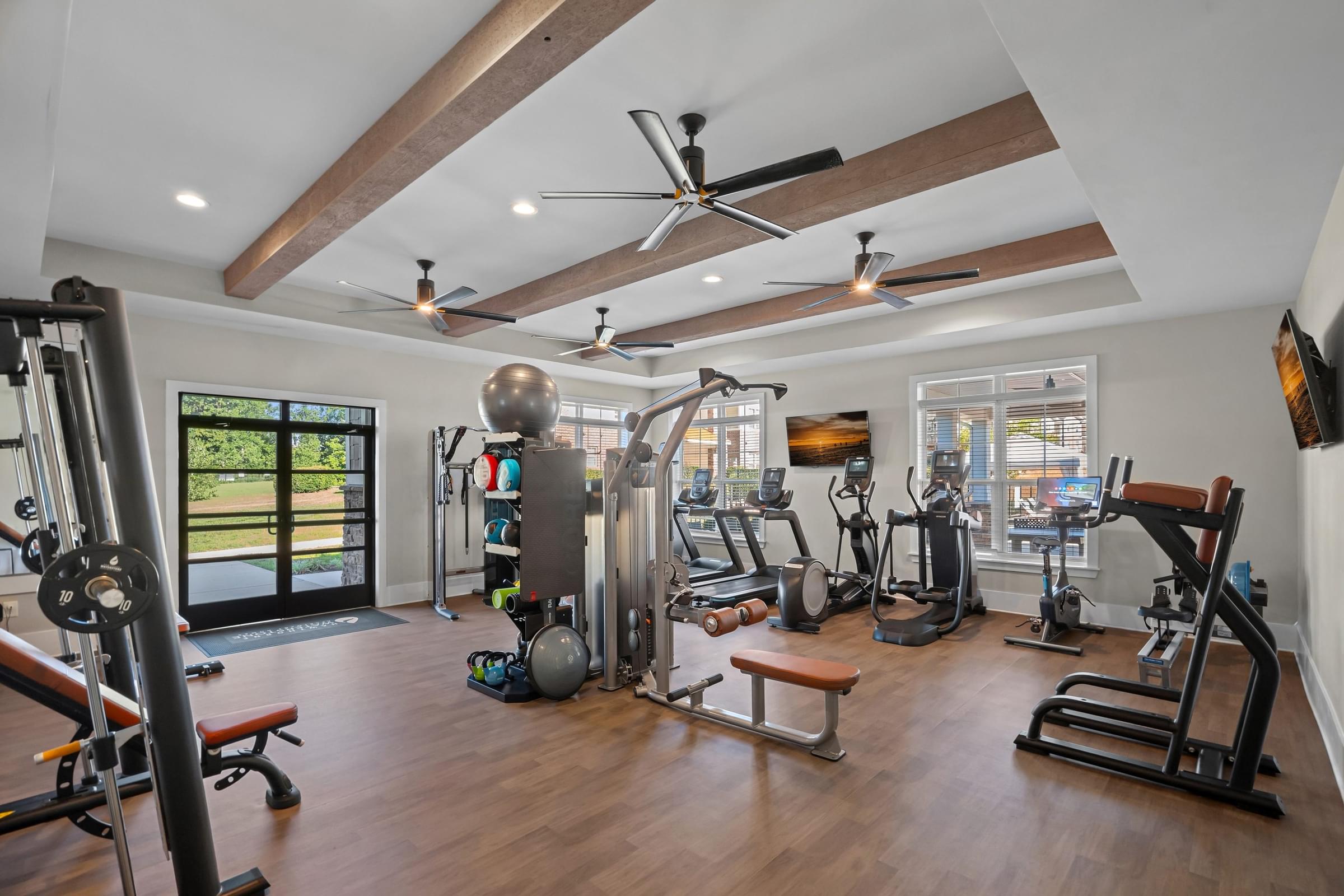 Amenities Highlight luxurious pool with small fountains, lounge seating, and cabanas