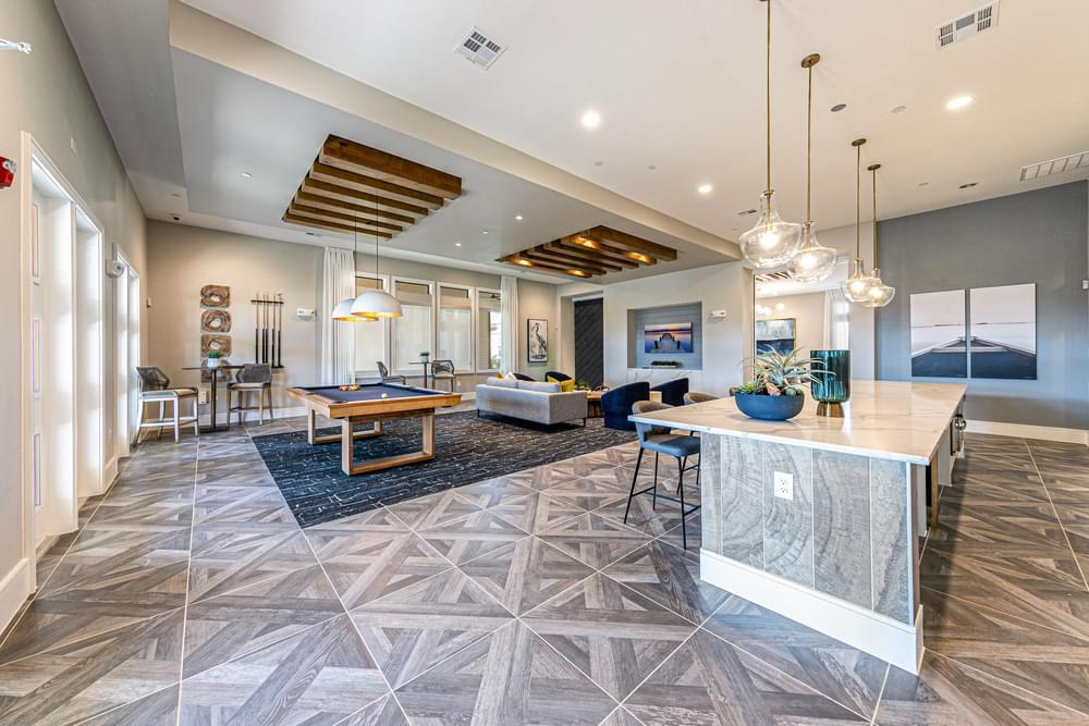 the preserve at ballantyne commons clubhouse with living room and dining area