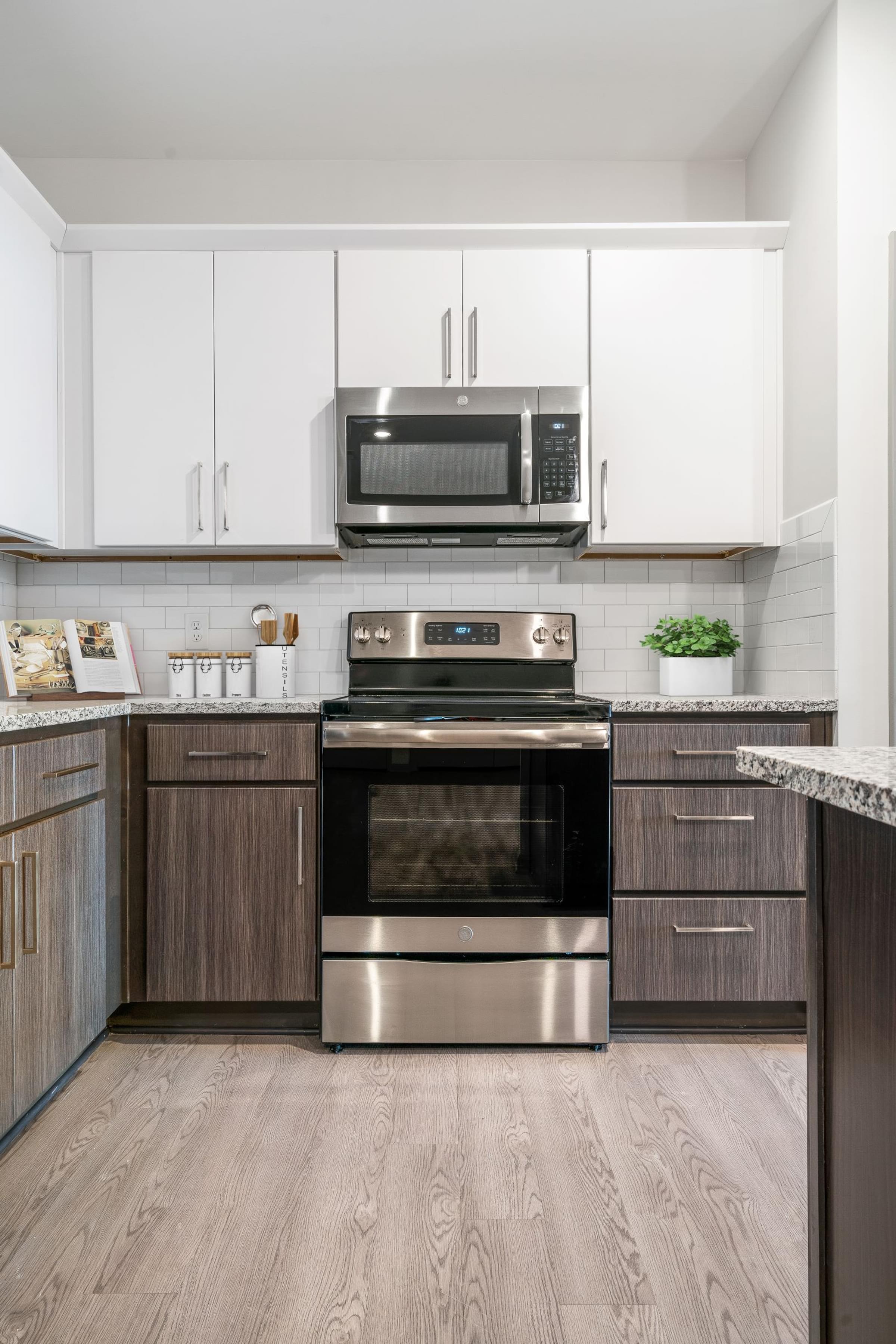 Two color custom cabinetry in your kitchen at Hawthorne at the Glen in Concord, NC Two color custom cabinetry in your kitchen at Hawthorne at the Glen in Concord, NC