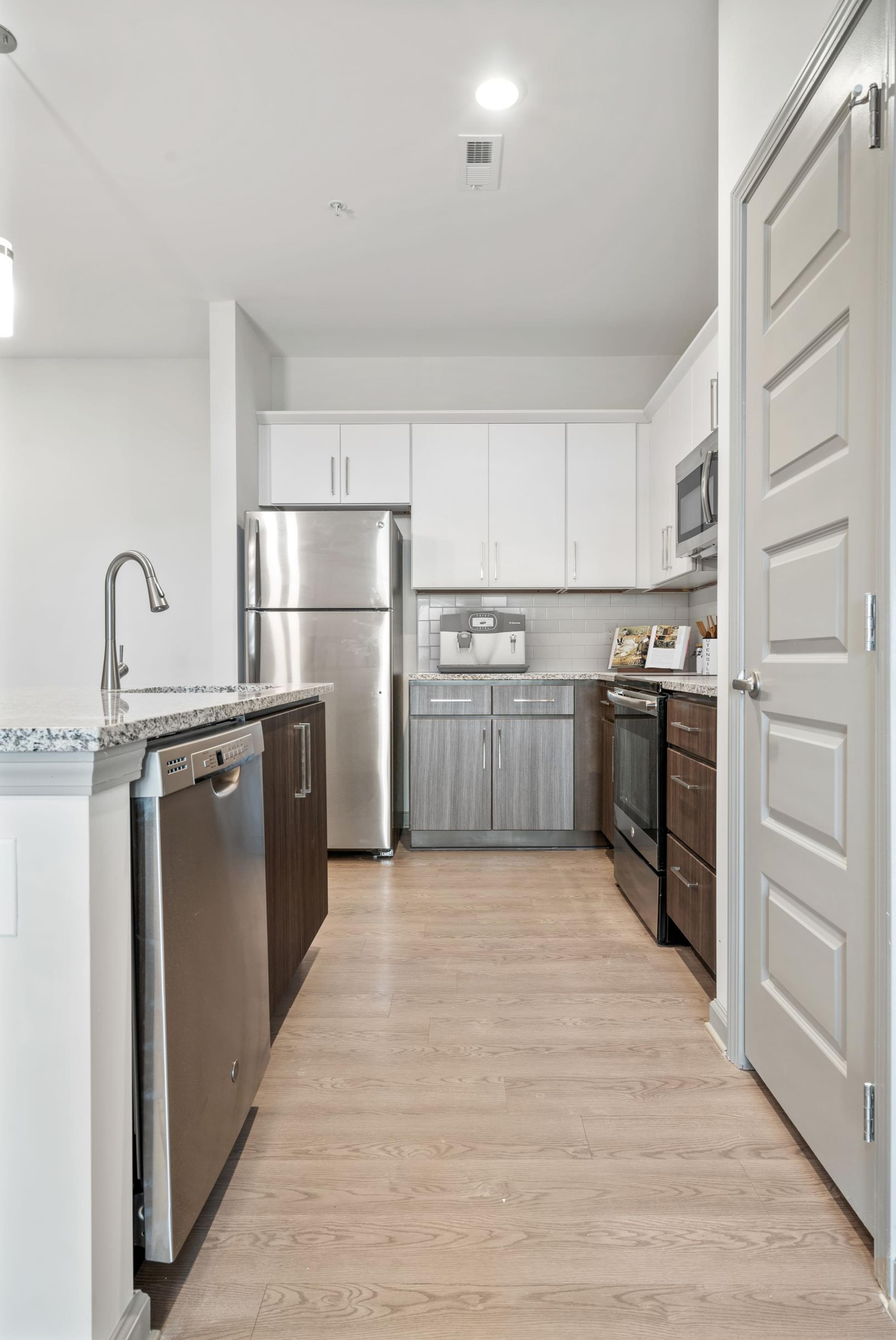 Two color custom cabinetry in your kitchen at Hawthorne at the Glen in Concord, NC Two color custom cabinetry in your kitchen at Hawthorne at the Glen in Concord, NC