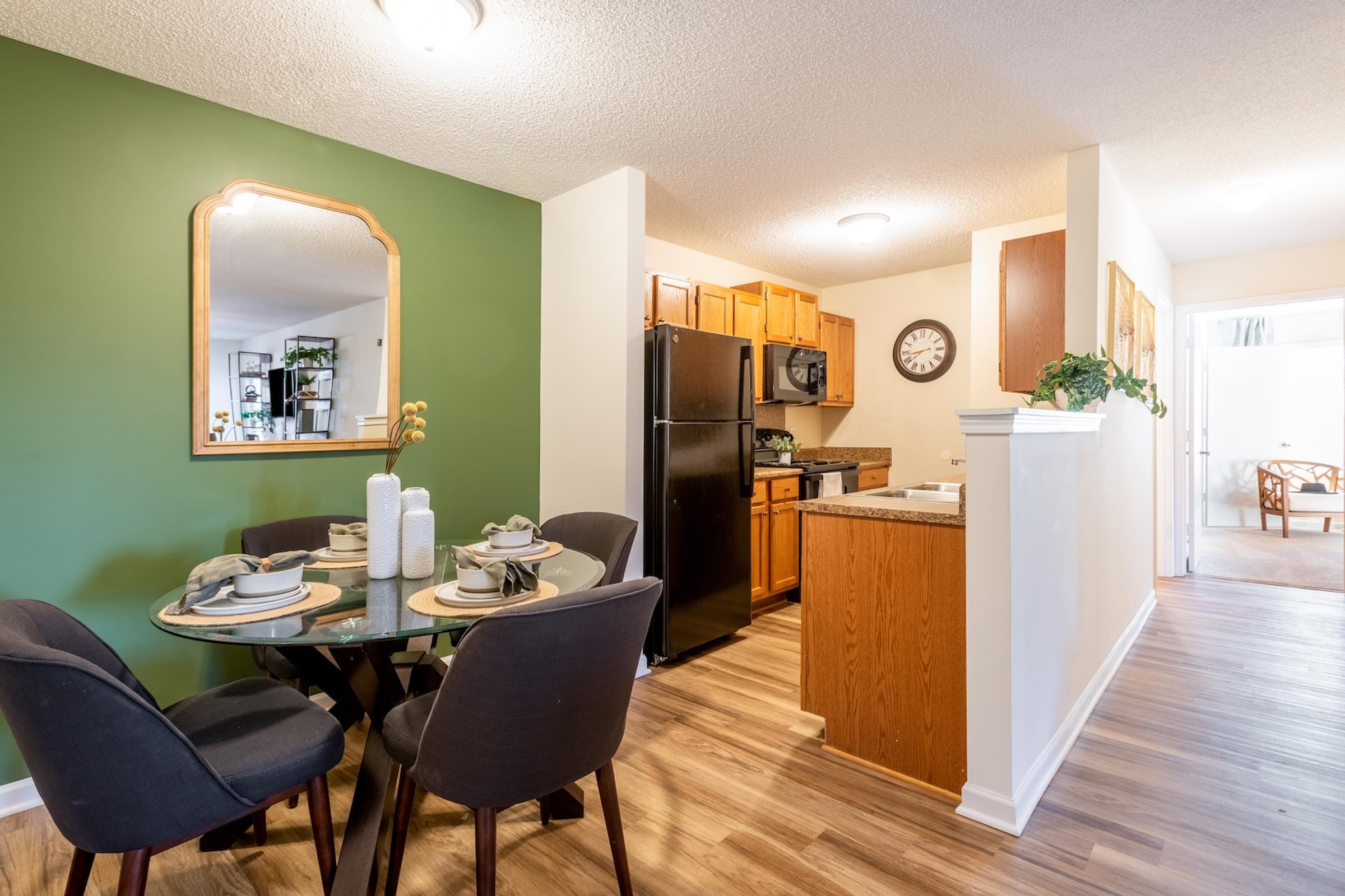 Kitchen and Dining Room Layout with Wood-Inspired Vinyl Flooring