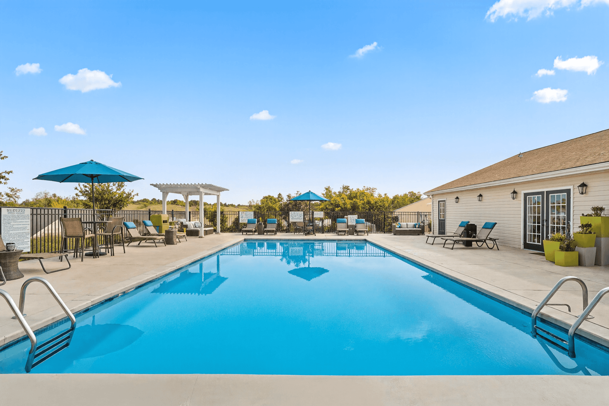 Resort-Style Swimming Pool with Expansive Sun Deck