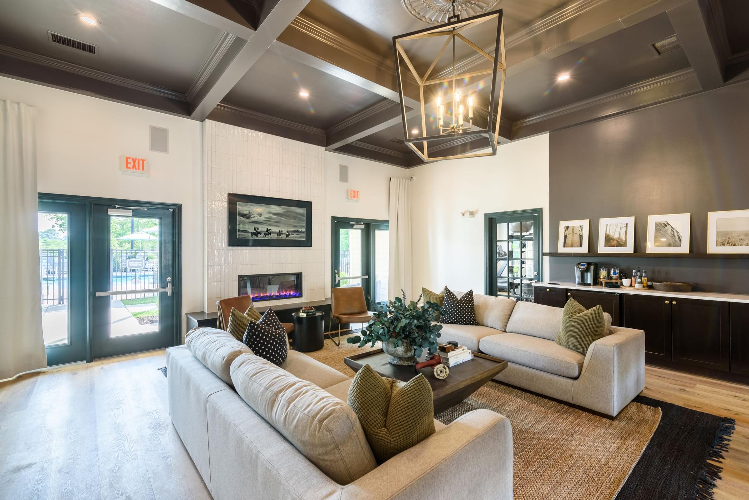 a living room with couches and a coffee table