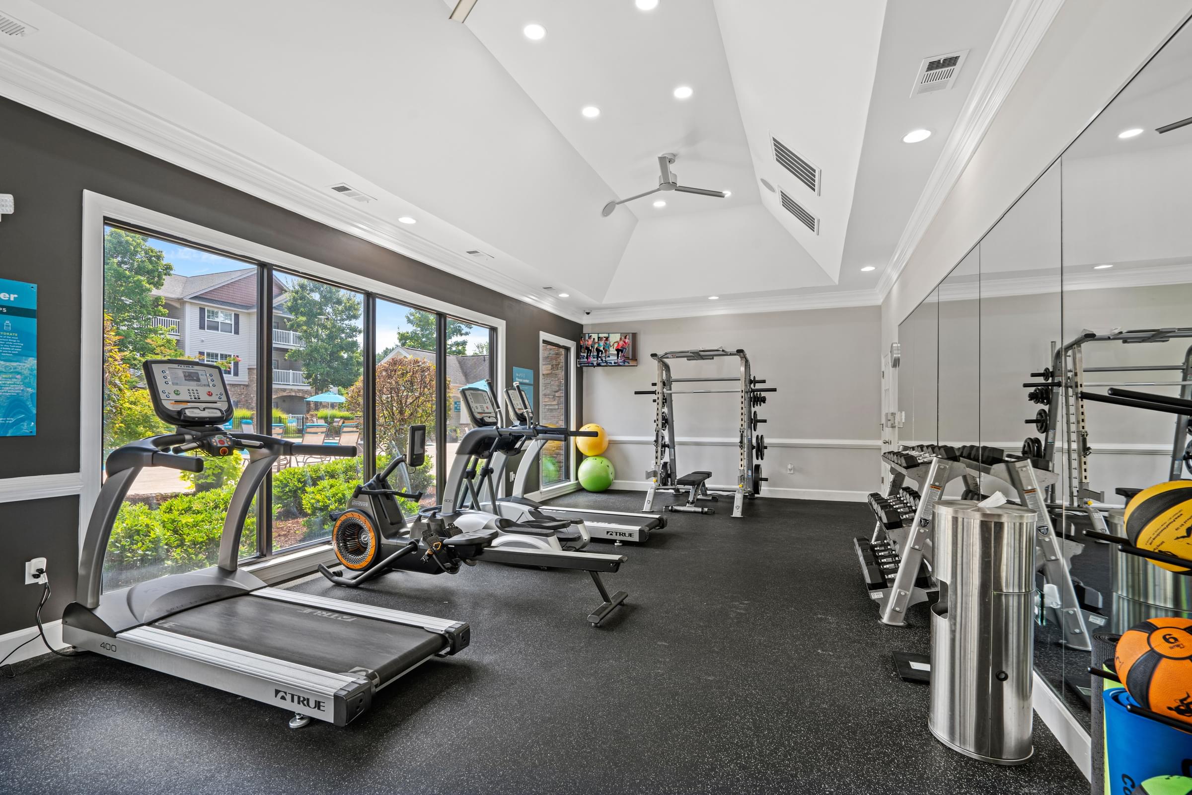 24-Hour Fitness Center with Cardio Equipment and Free Weights
