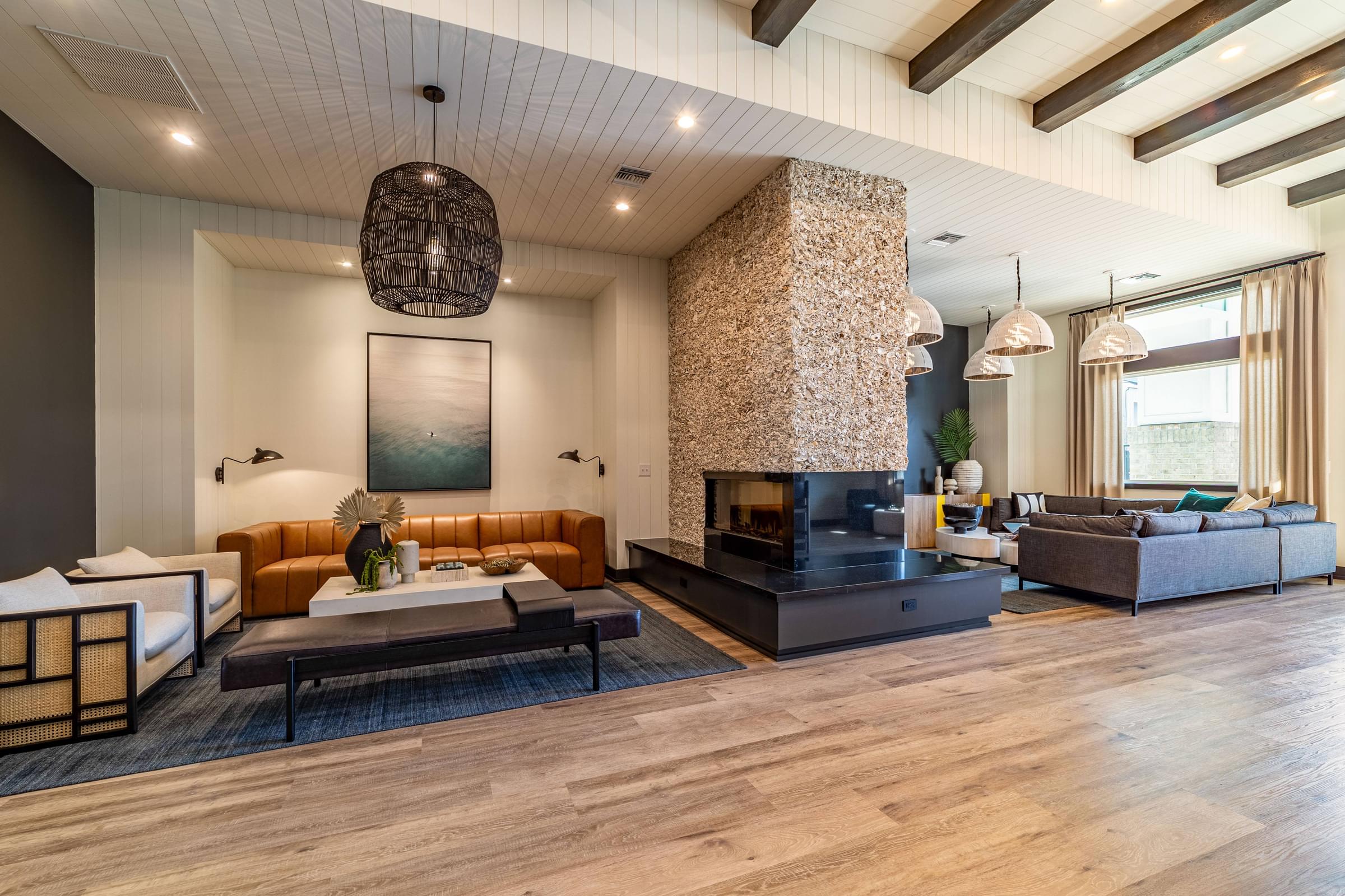 a living room with couches and a fireplace