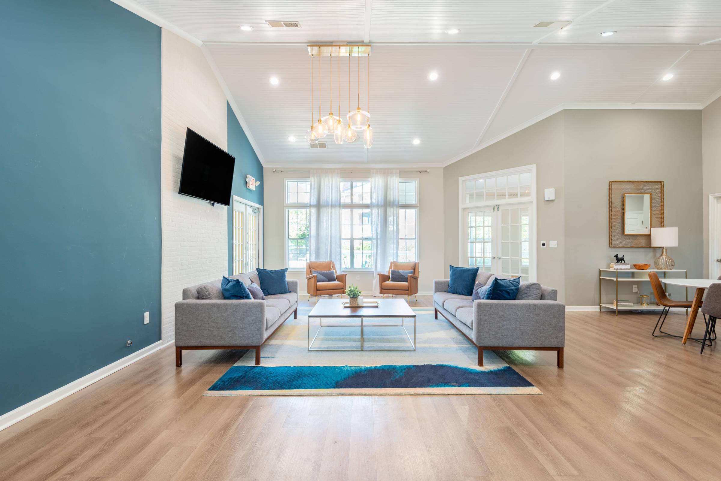 a living room with couches and a coffee table