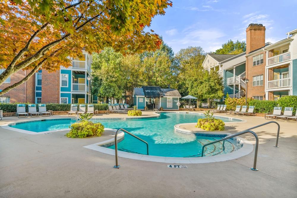 the preserve at ballantyne commons pool and spa with apartment buildings