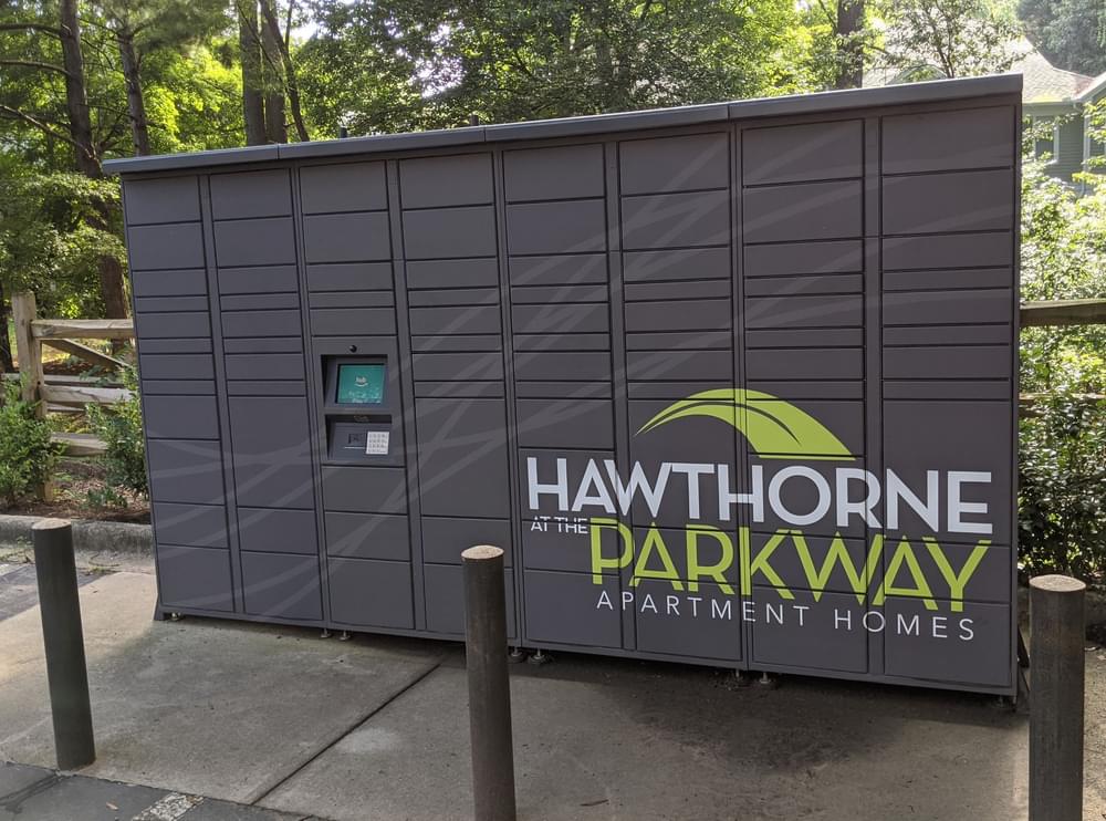 a shed with the hawthorne parkway apartment homes logo on it