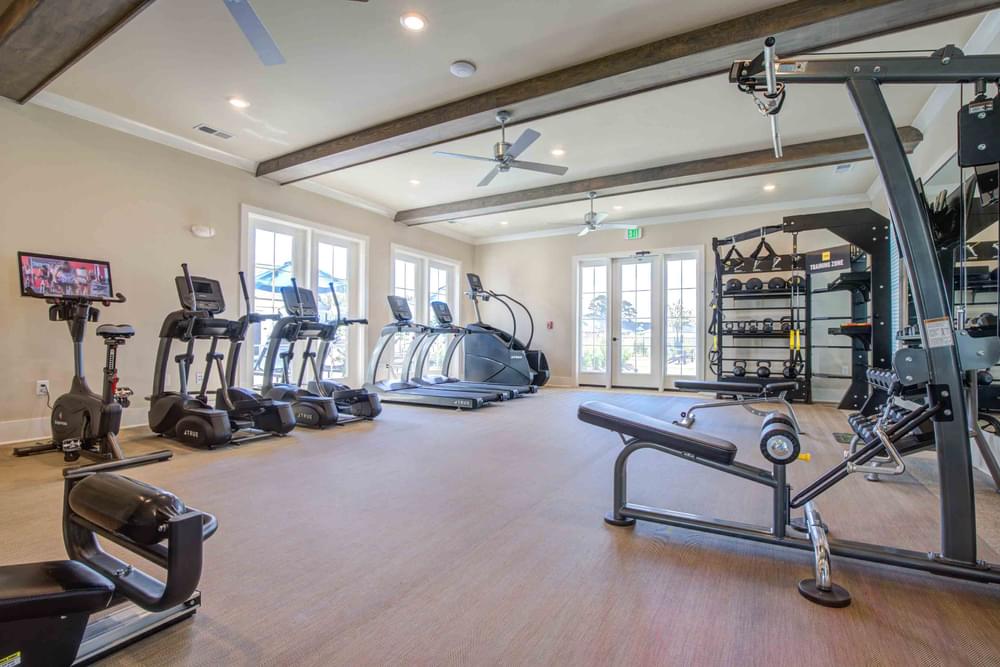 gym with cardio equipment at the villas at falling waters townhomes in west omaha