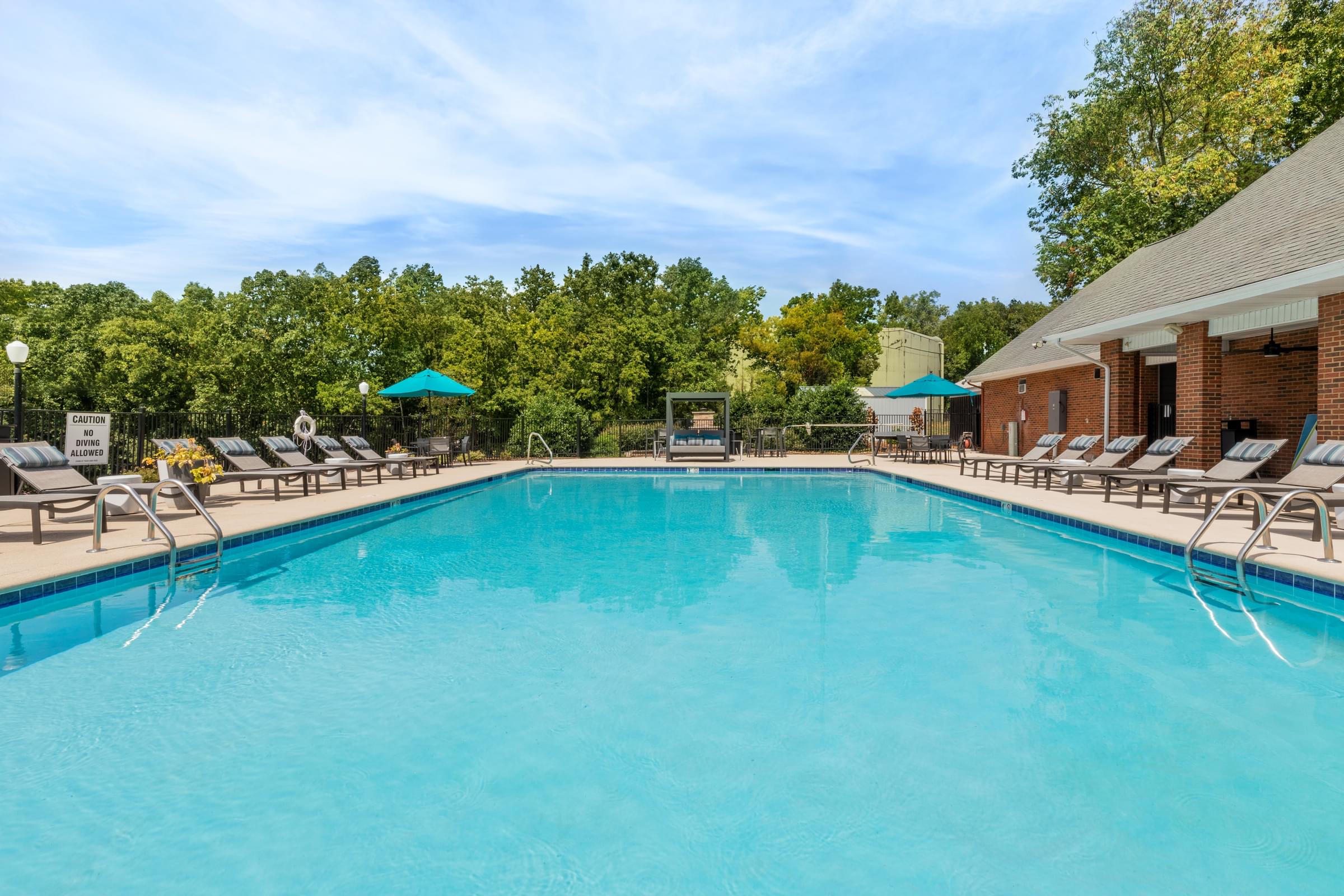 Saltwater Swimming Pool with Expansive Sundeck and Poolside Grill