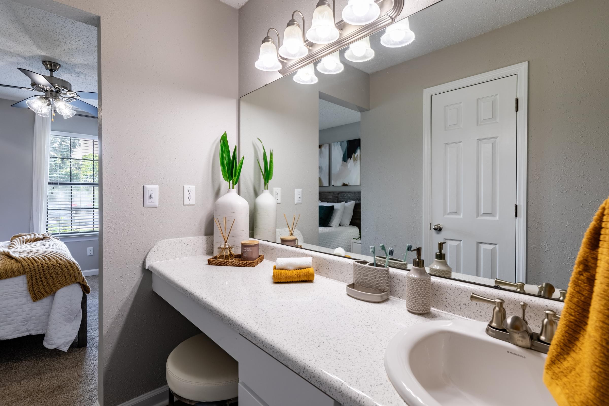 Bathroom with Built-in Vanity and Designer Lighting