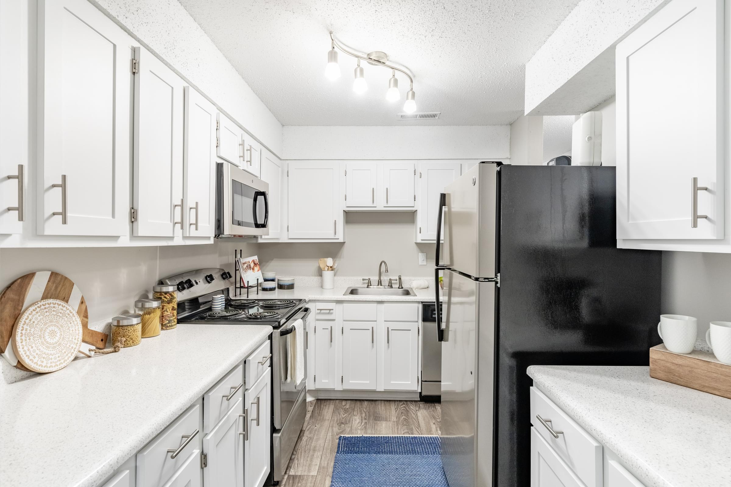 Spacious Modern Kitchen with Custom Cabinetry and Stainless Steel Energy Efficient Appliances