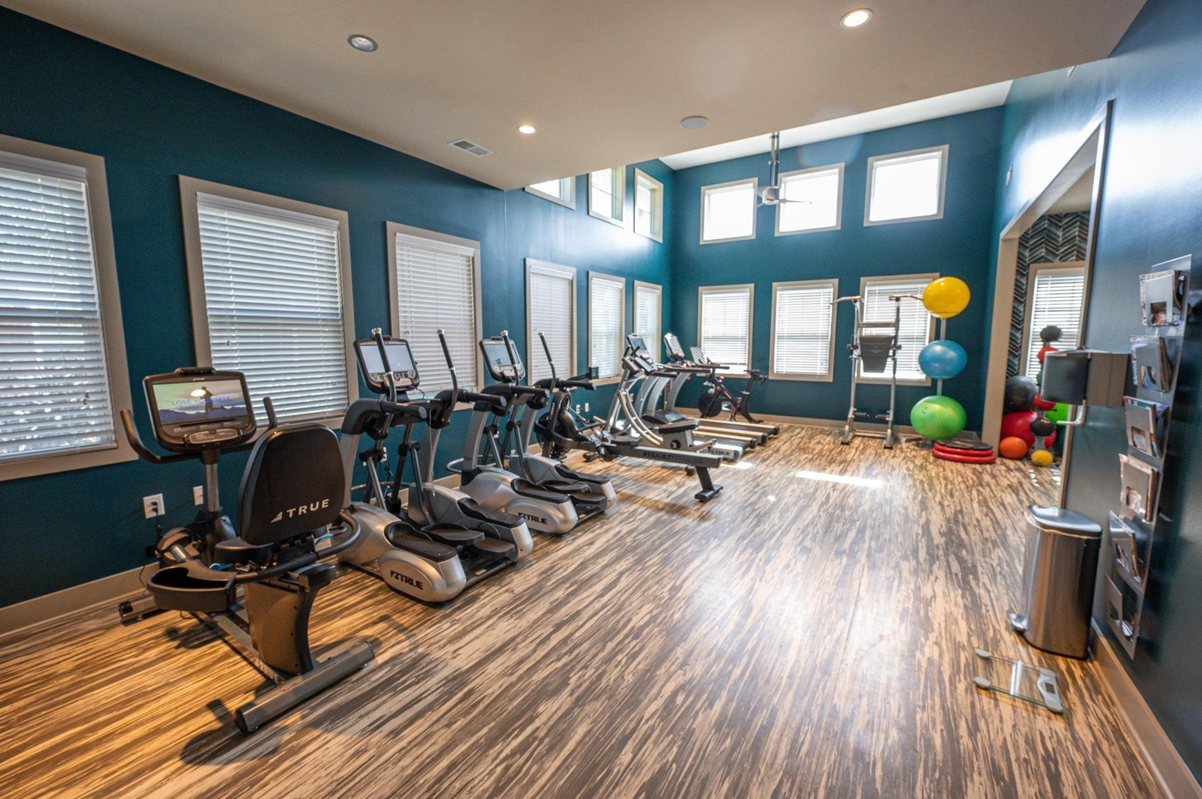 24-Hour Fitness Center with Cardio Equipment, Free Weights, Yoga Equipment and Health Hub