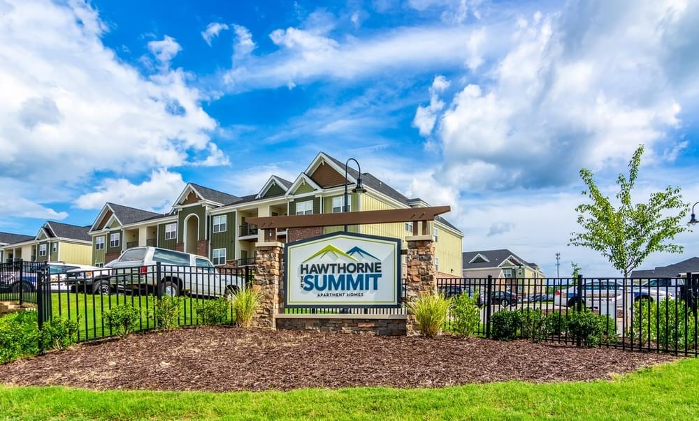 the preserve at summit sign in front of an apartment building