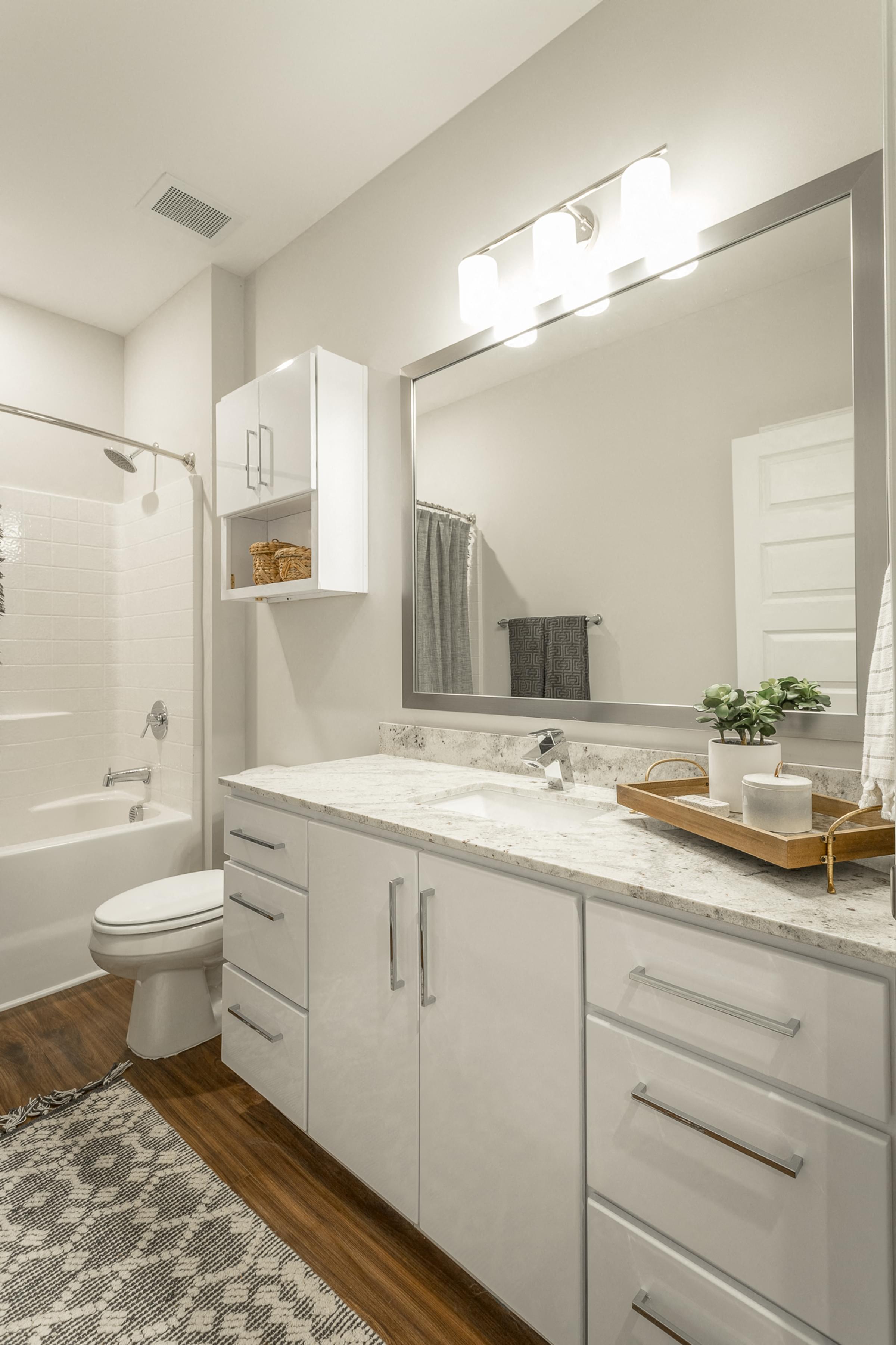 Hawthorne at the W Bathroom with Granite Countertops and Ample Storage