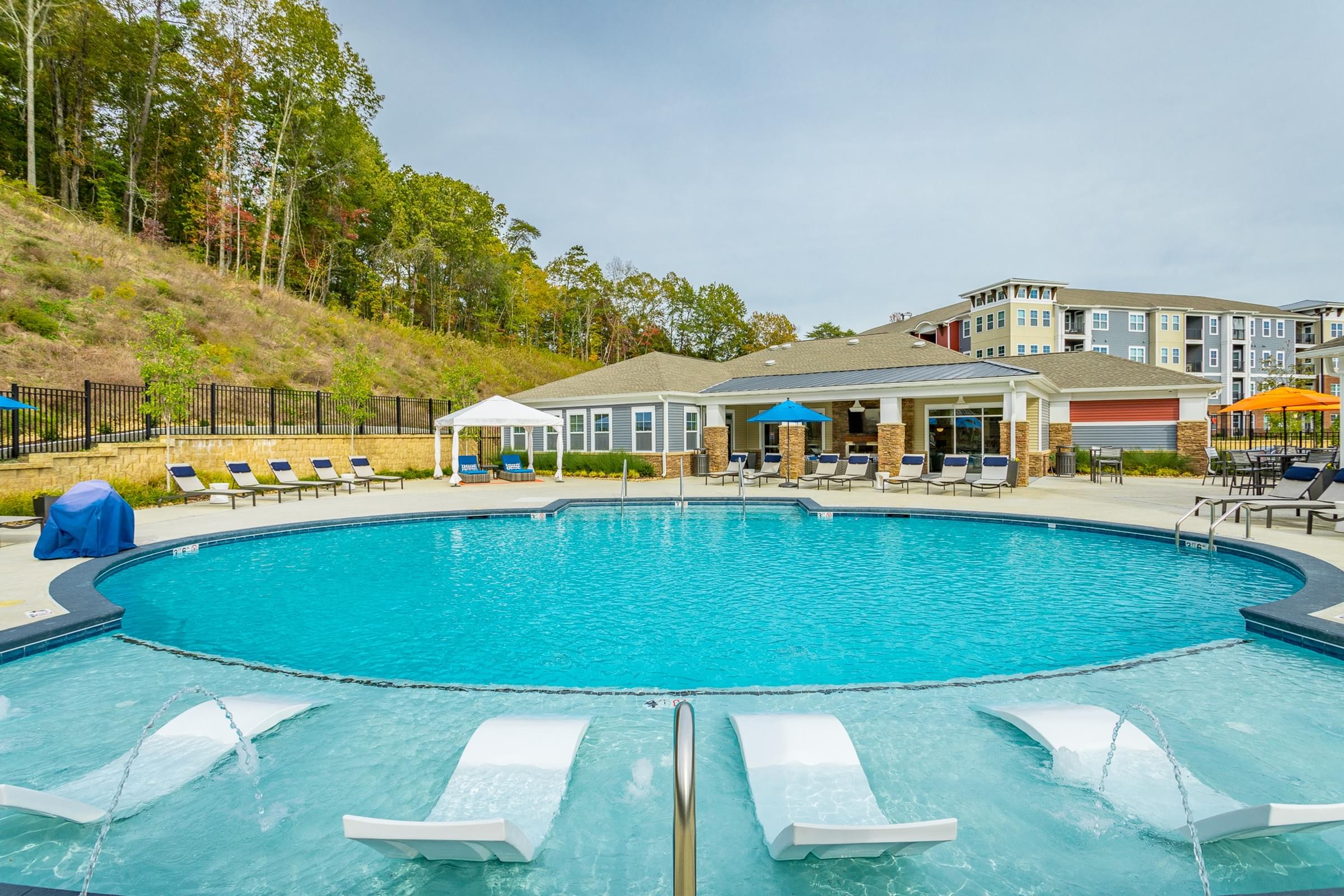 Sparkling Swimming Pool at Hawthorne at the W in Chattanooga, TN Resort Style Swimming Pool With Submerged Loungers