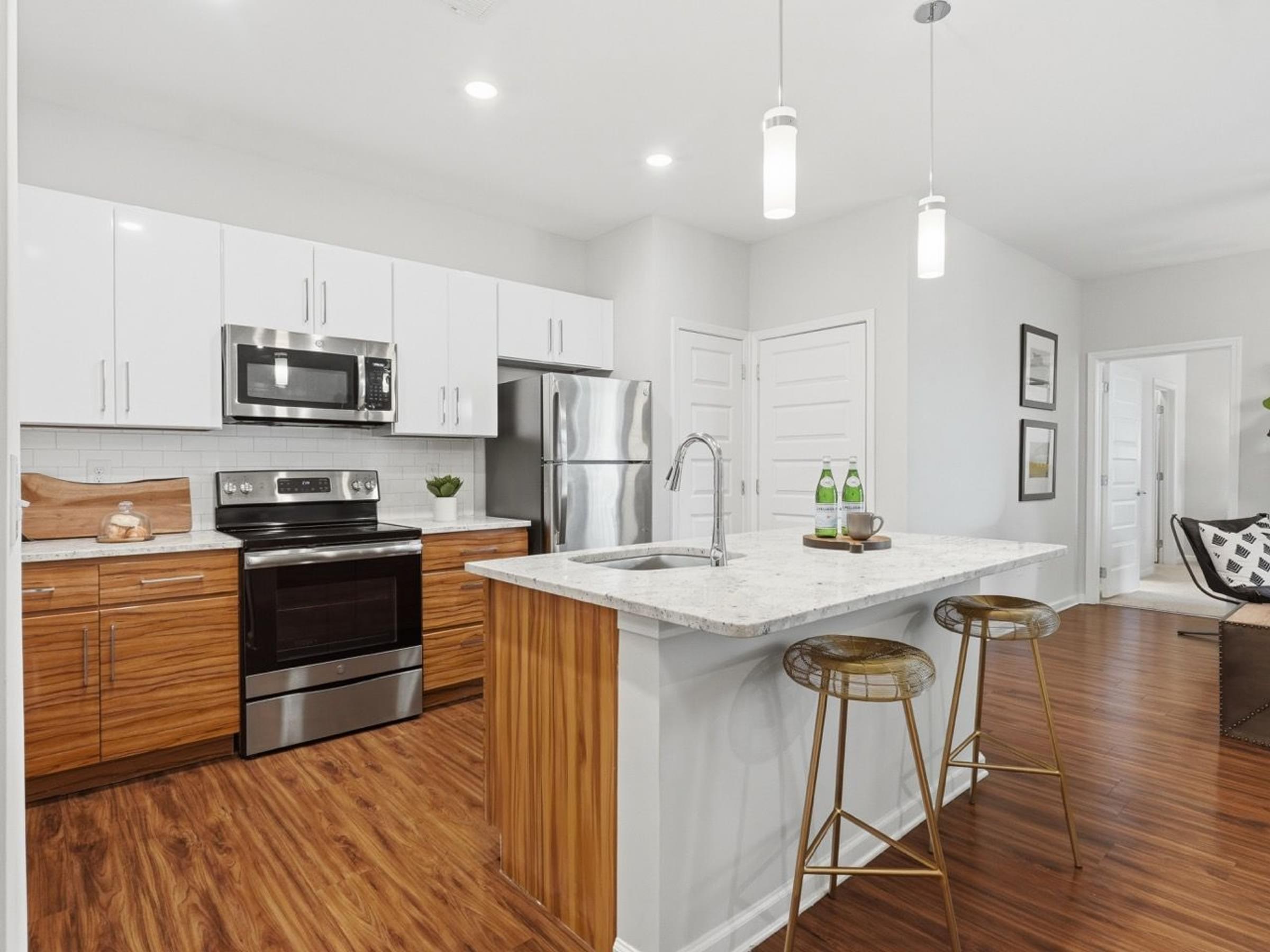 Modern Kitchens With Stand-Alone Islands And Breakfast Bars