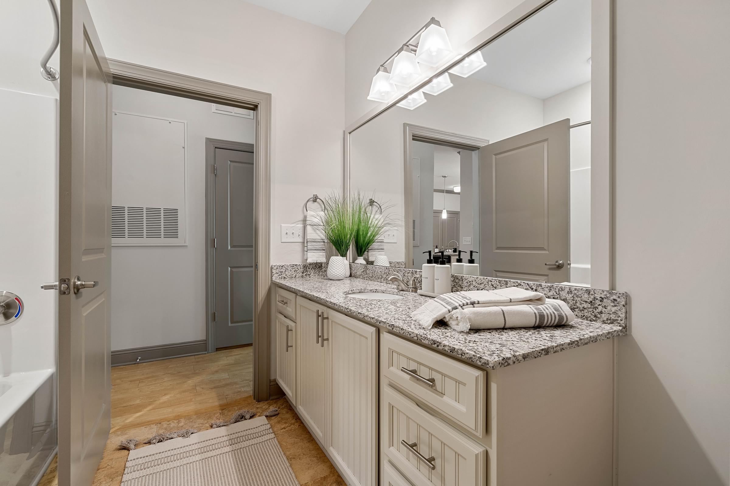 Hawthorne at Weaverville Bathroom with Granite Countertops and Ample Storage