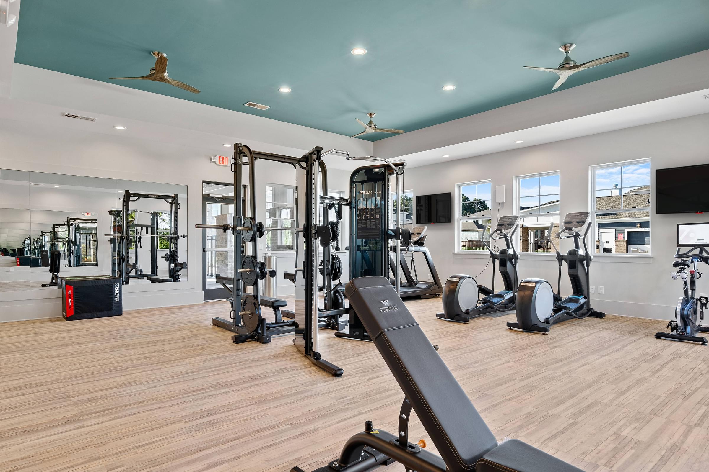 Fitness Center Equipped with Cardio Equipment, and Free Weights