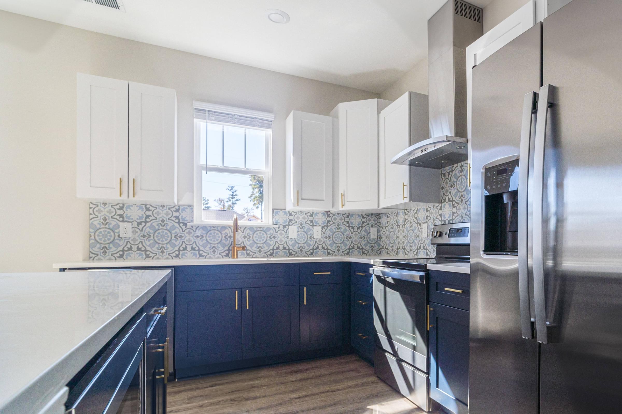 Modern Kitchens with Stand-Alone Islands and Designer Tile Backsplash