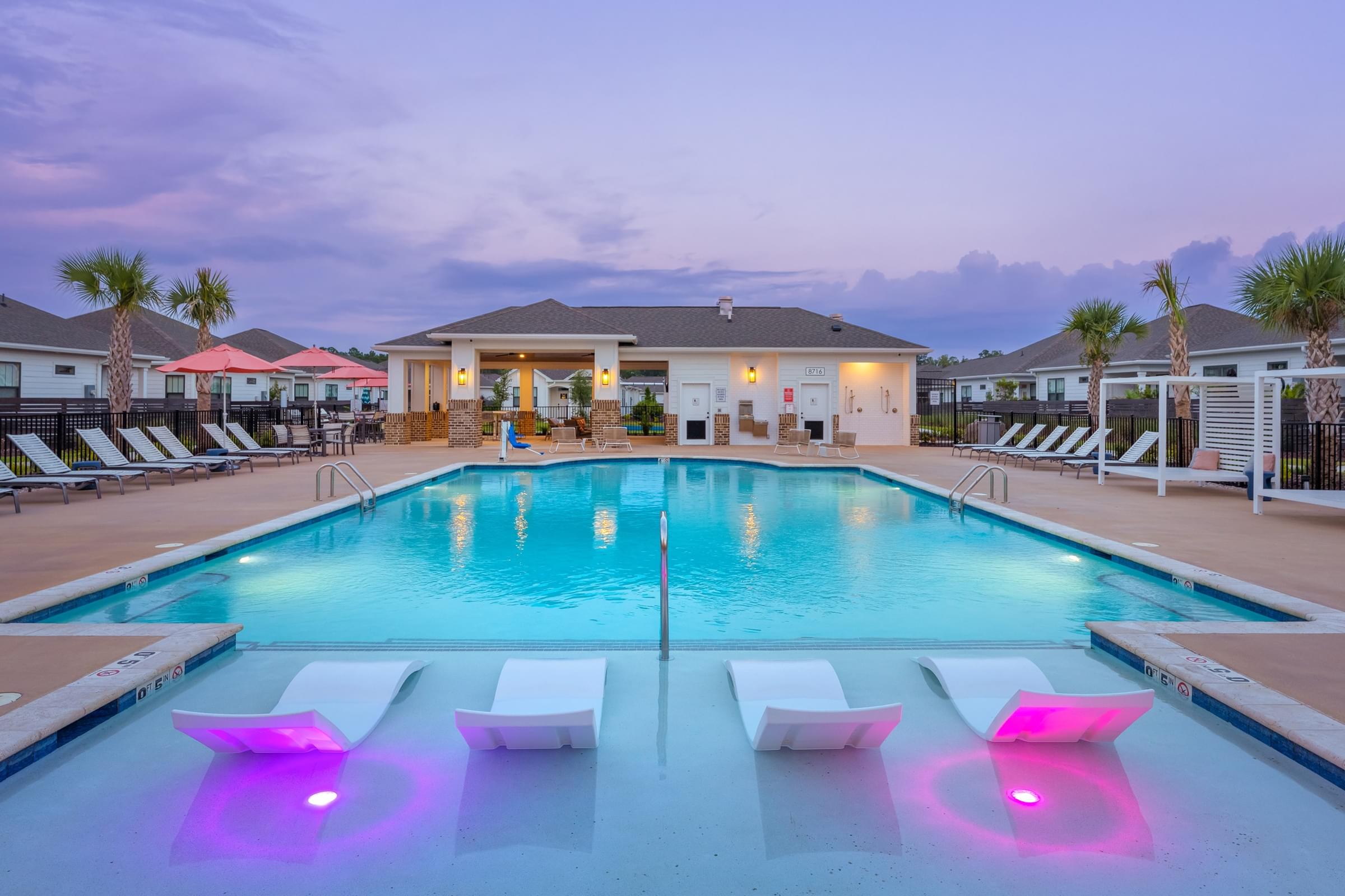 Custom Saltwater Swimming Pool with Sun Shelf and Inset Seating