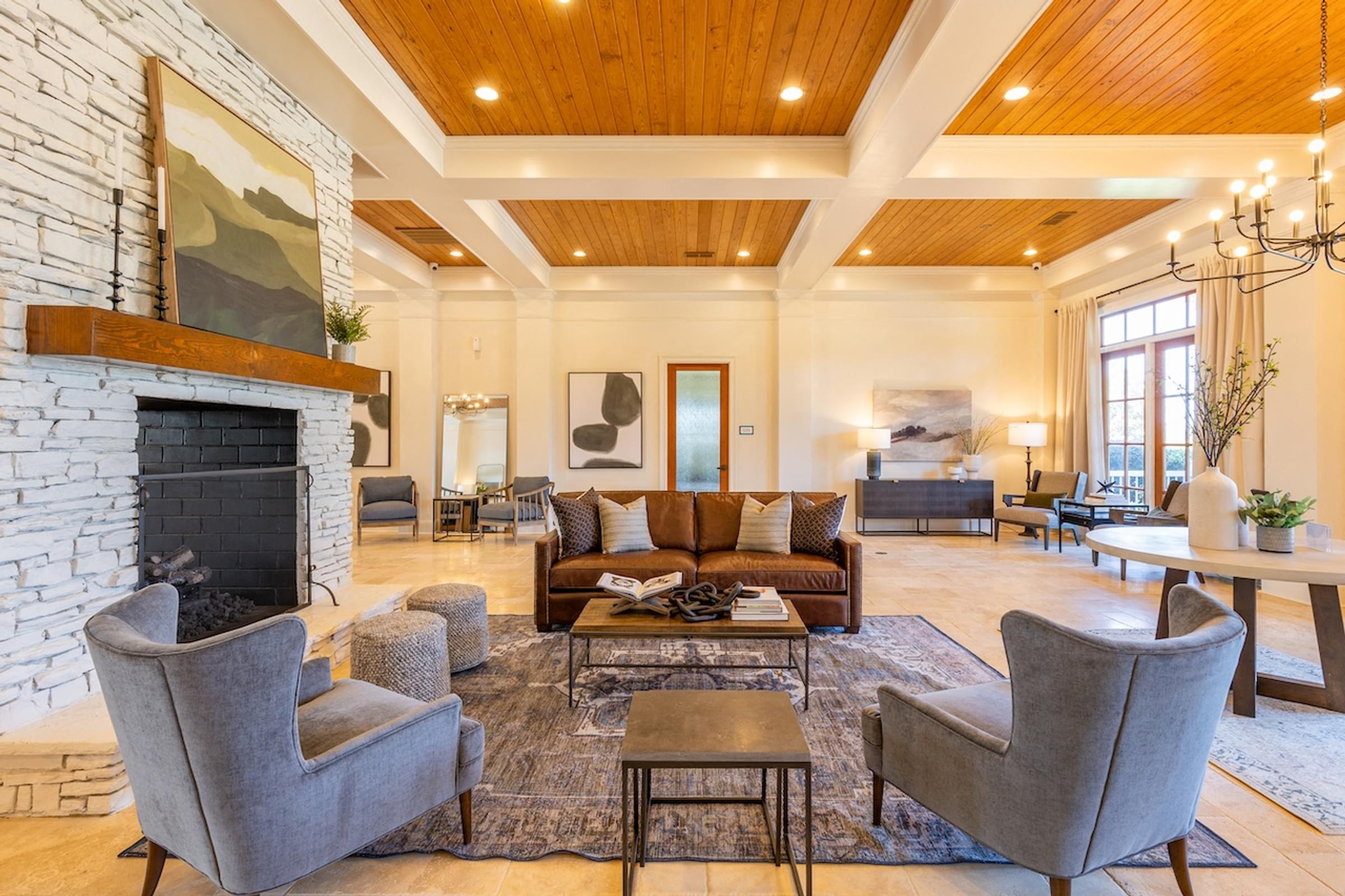 Resident Clubhouse with Cozy Fireplace and Lounge Seating