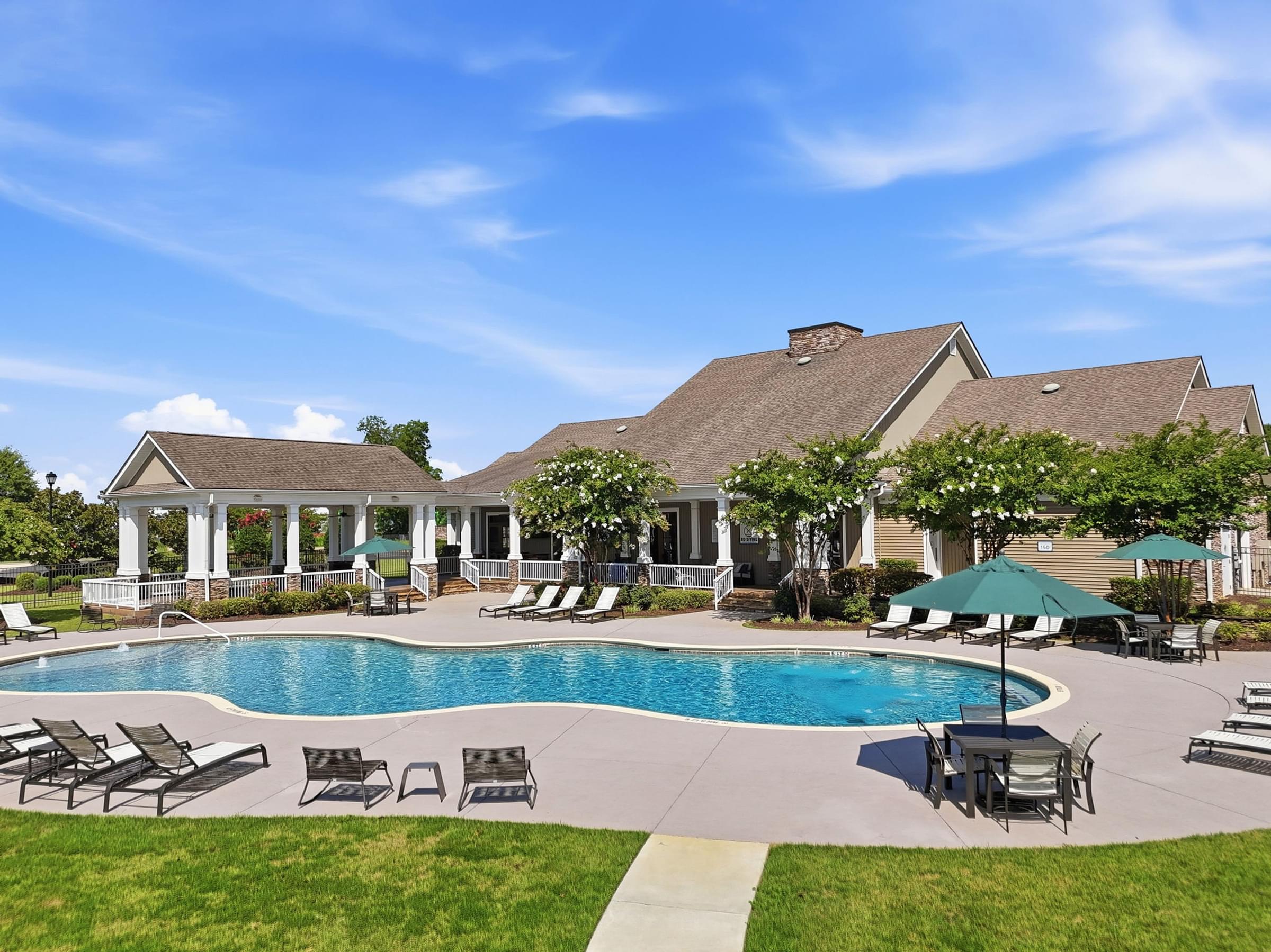 Resort-Style Swimming Pool with Sun Shelf and Expansive Sundeck