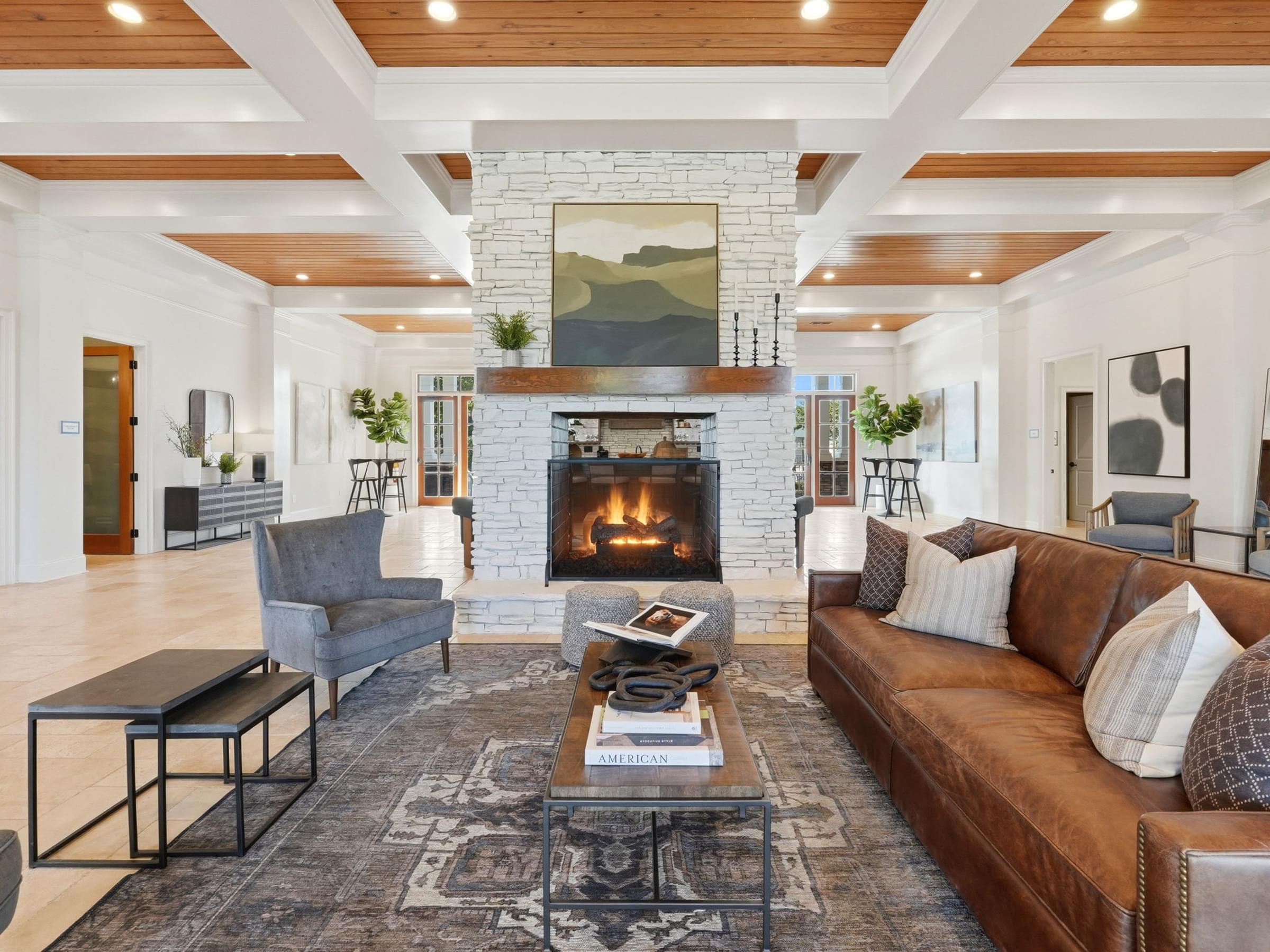 Resident Clubhouse with Cozy Fireplace and Lounge Seating