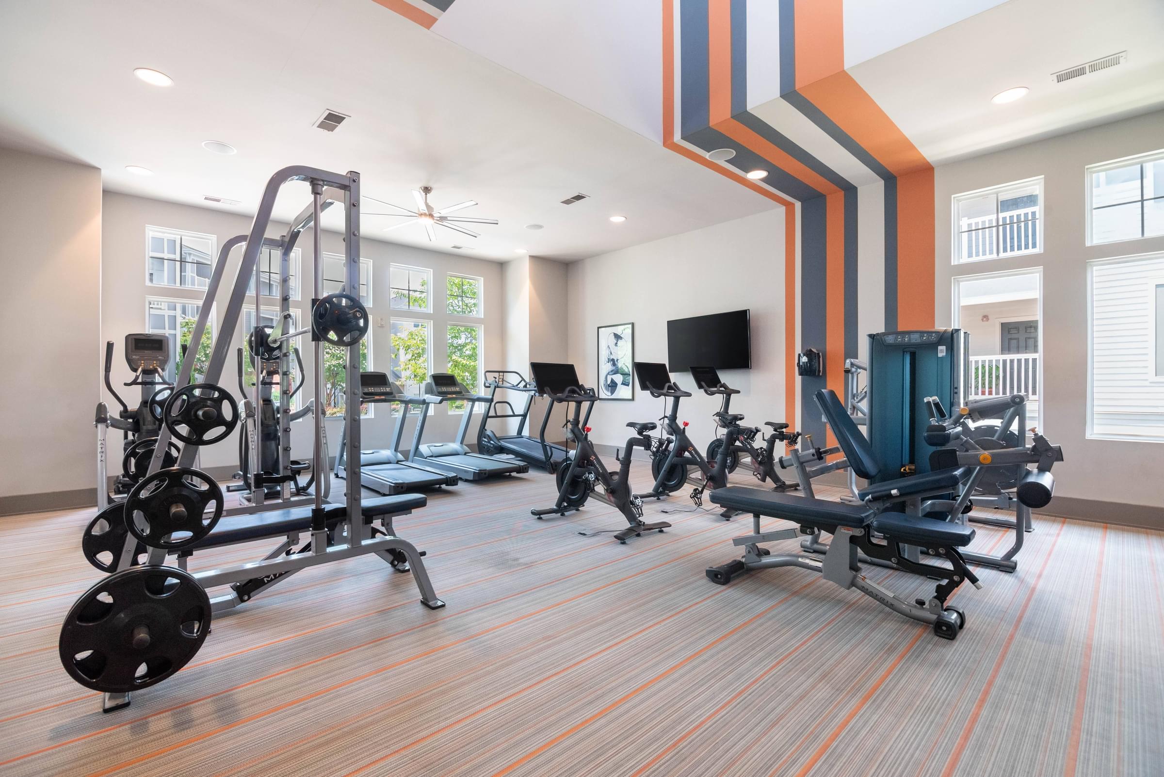 24-Hour Fitness Center with Cardio Equipment and Free Weights