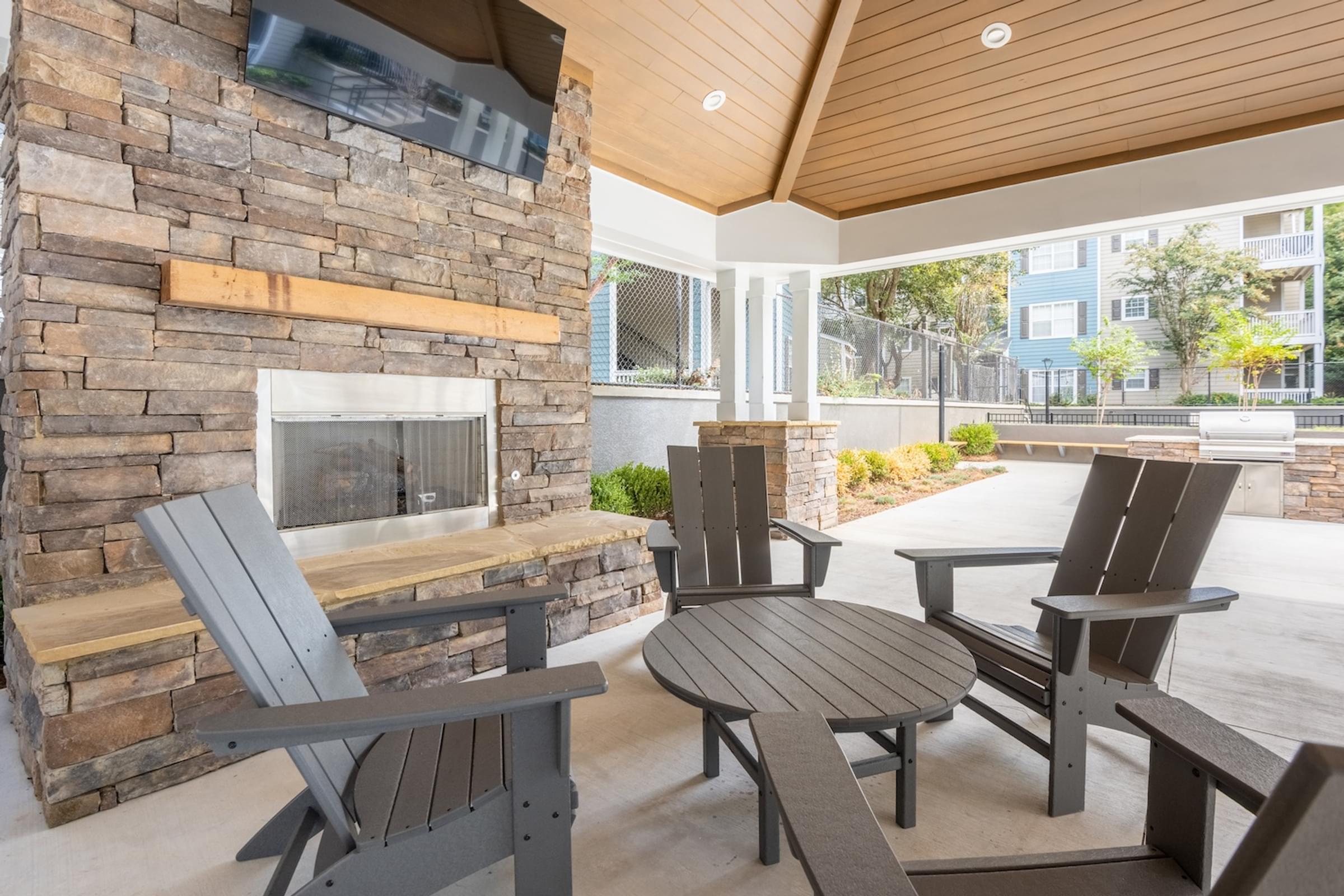 Outdoor Pavillon with a Fireplace and Seating