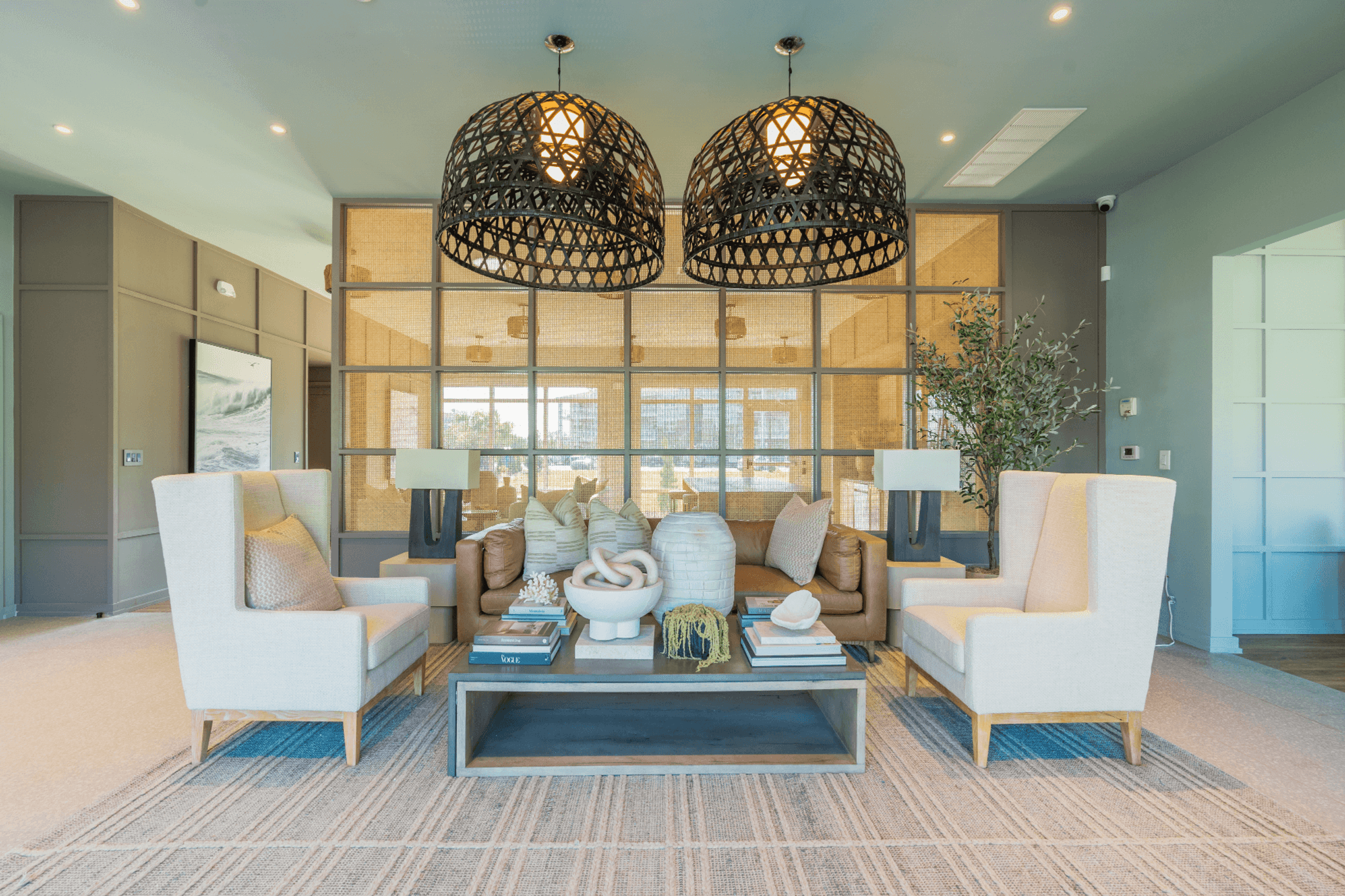 a living room with couches and chairs and a coffee table