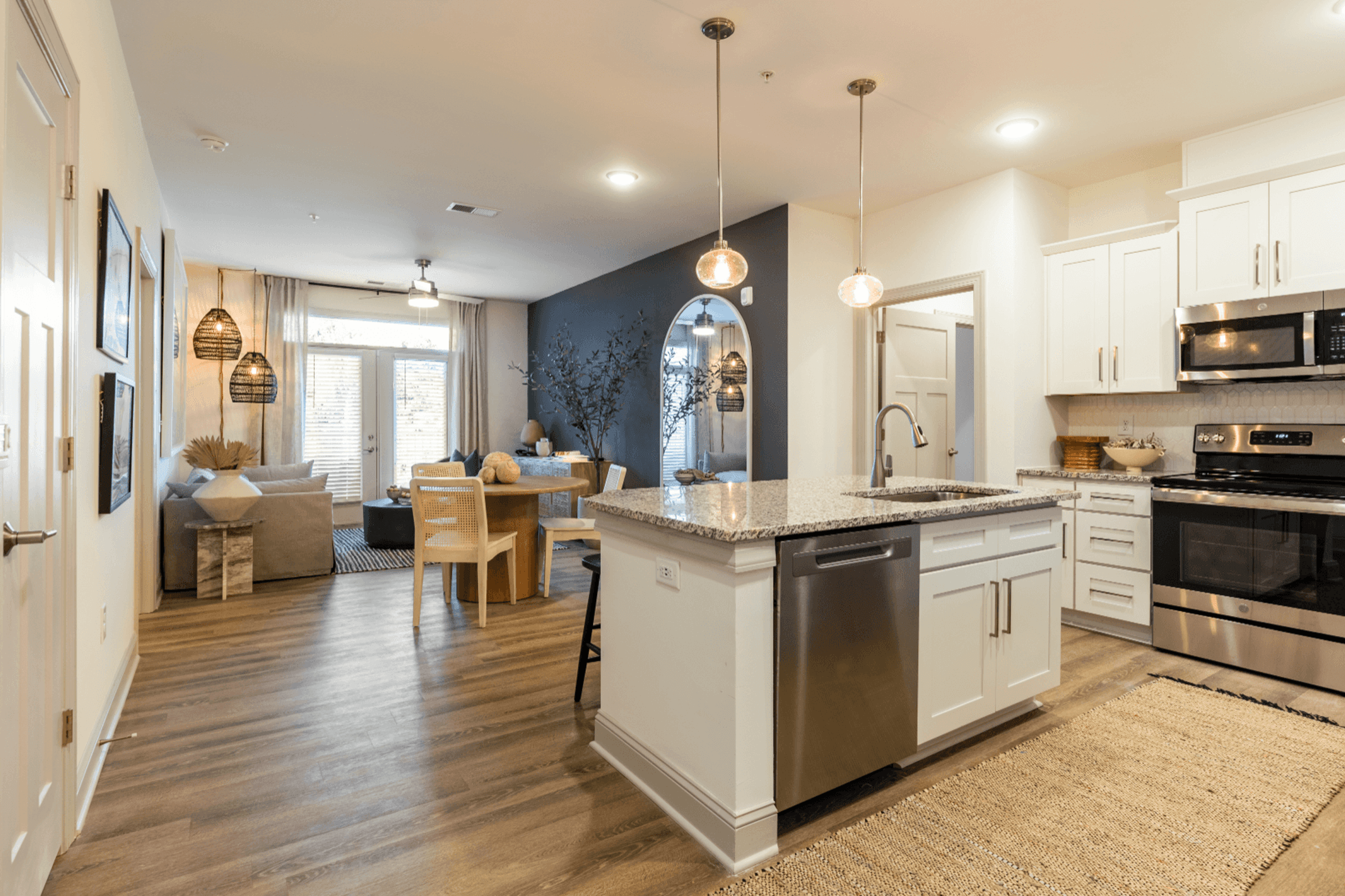 a kitchen with an island in the middle of it