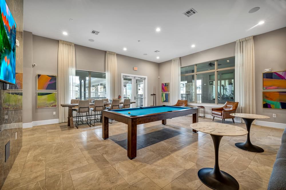 play a game of pool in our clubhouse at our apartments